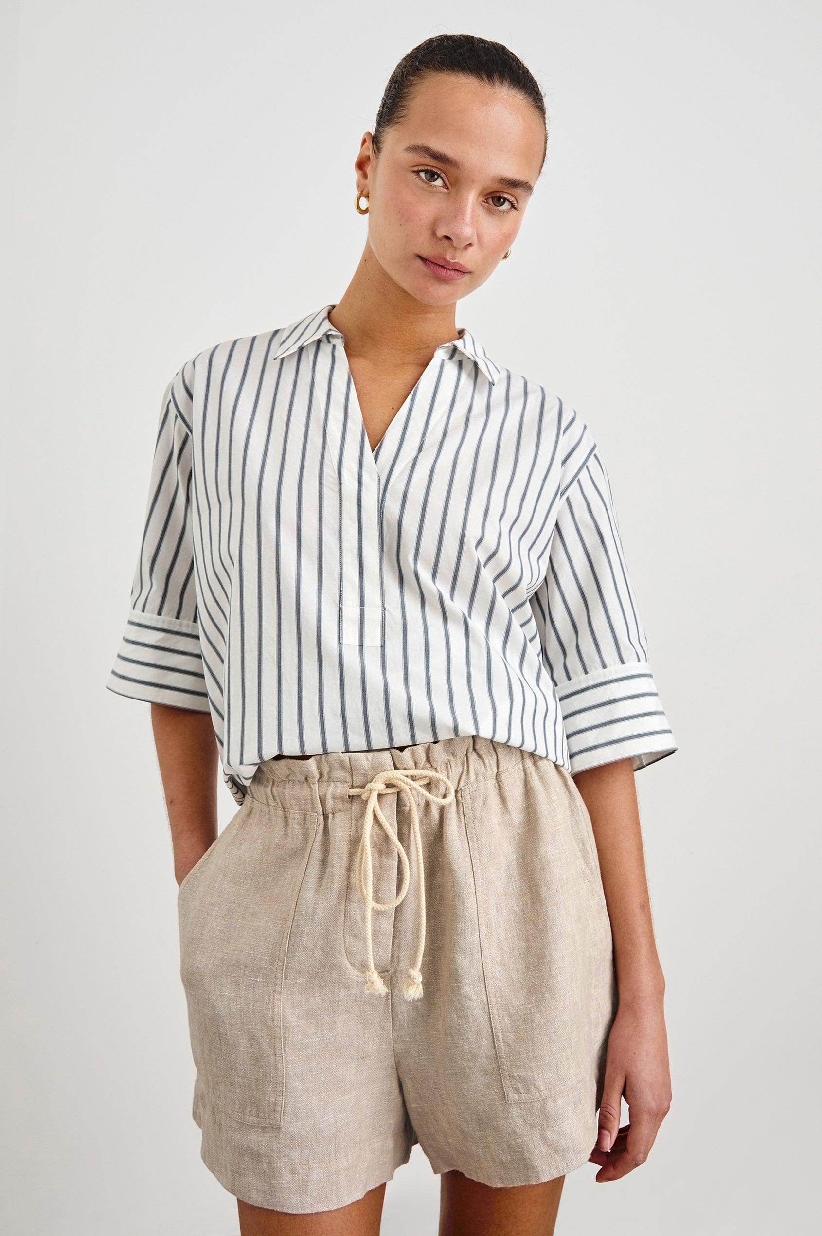 Juda 3/4 Sleeve Top With Front Placket And Collar In Colorway Chalk Slate Stripe - front view on model, tucked in