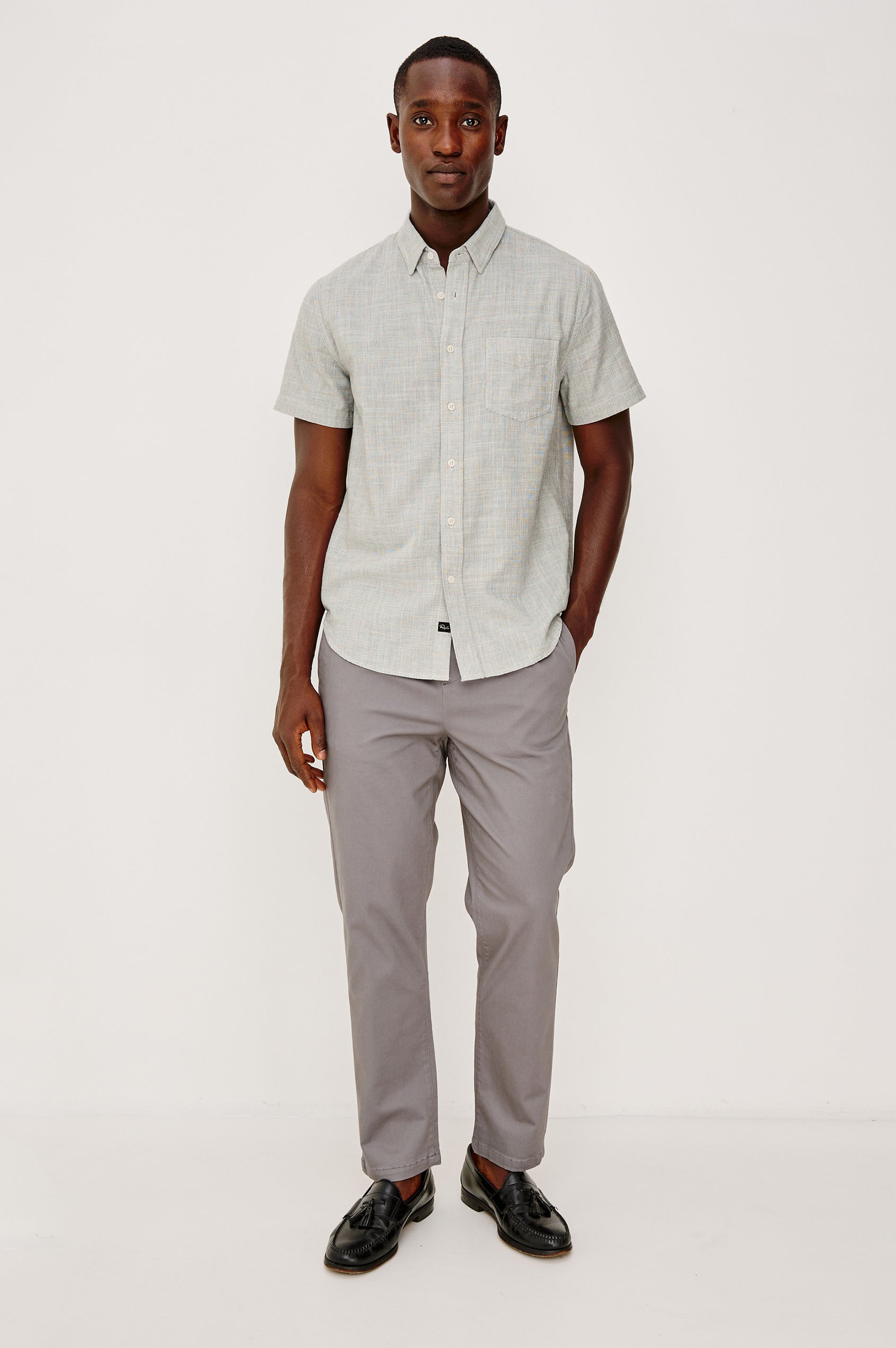 Julian Pant in Sueded Cotton Stretch with an Elastic Waist, Side Pockets, and Two Back Welt Pockets in Concrete Colorway - Full Body Front View Featured on Model