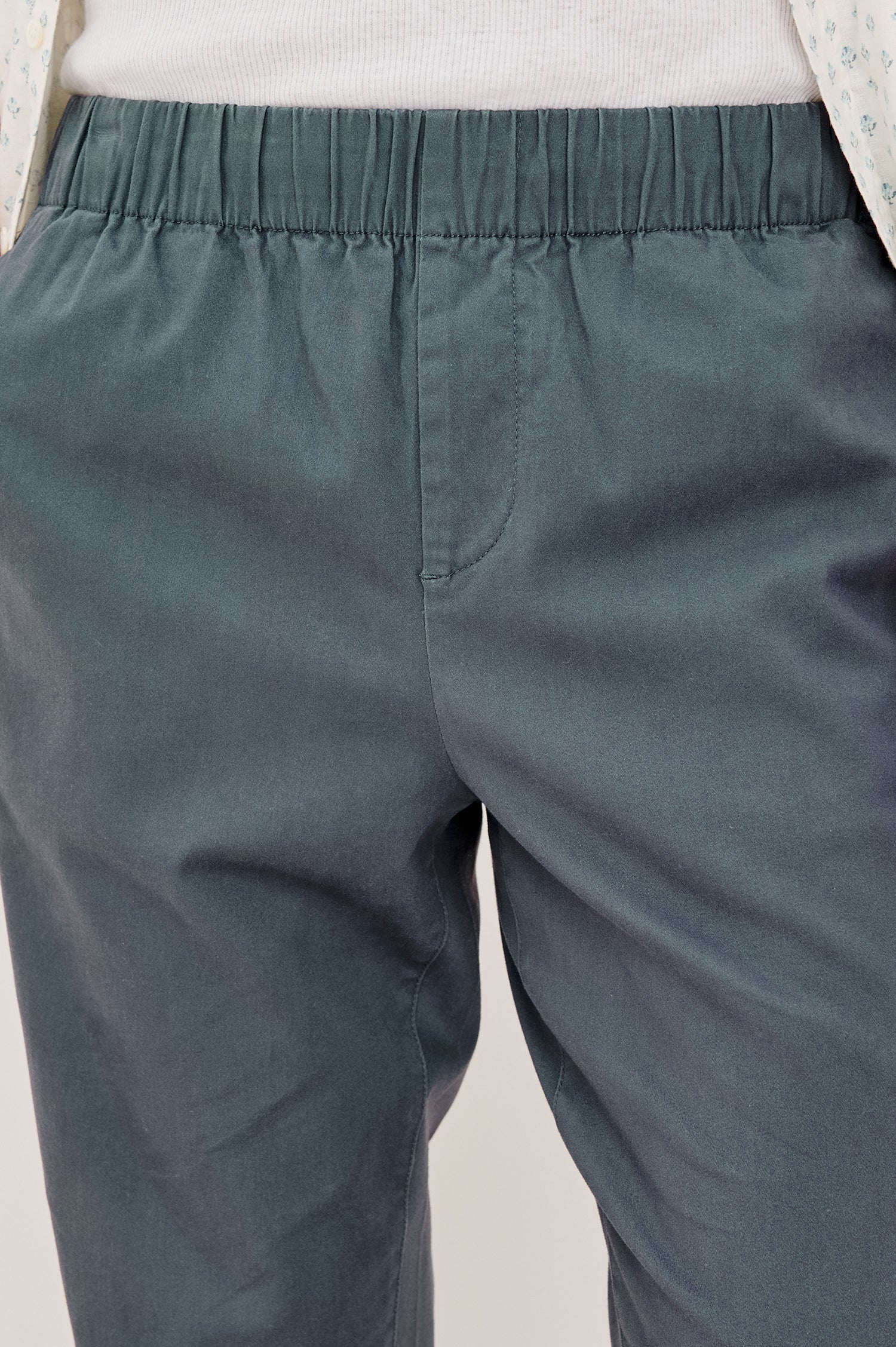 Julian Relaxed Slim Pant in Cotton Blend With Elastic Waist, Back Welt Pockets, and Garment-Dyed for Lived-in Look in Faded Blue Colorway - Lower Body Front View Featured on Model