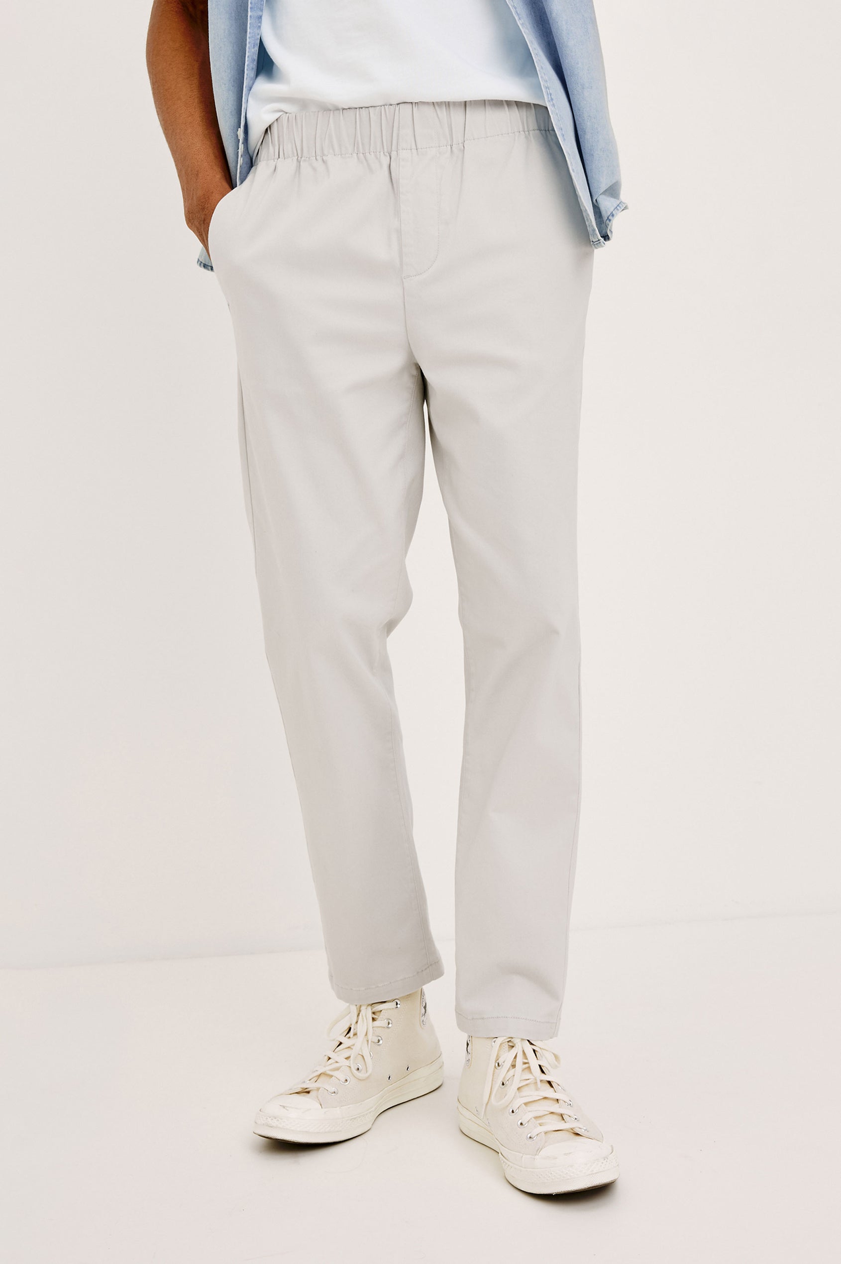 Julian Pants with an Elastic Waist, Two Front Pockets and Two Back Welt Pockets in Natural Colorway - Front View Featured on Model