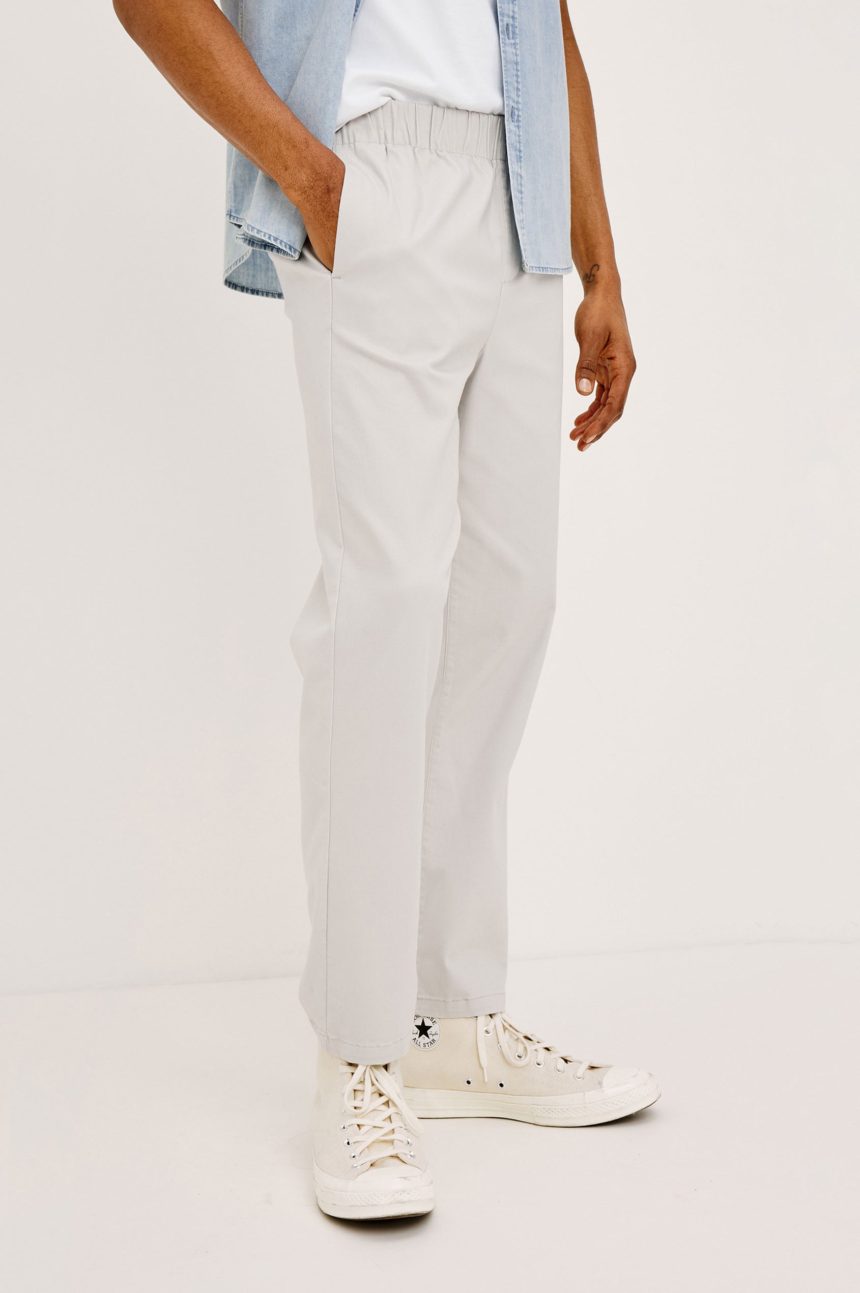 Julian Pants with an Elastic Waist, Two Front Pockets and Two Back Welt Pockets in Natural Colorway - Back View Featured on Model