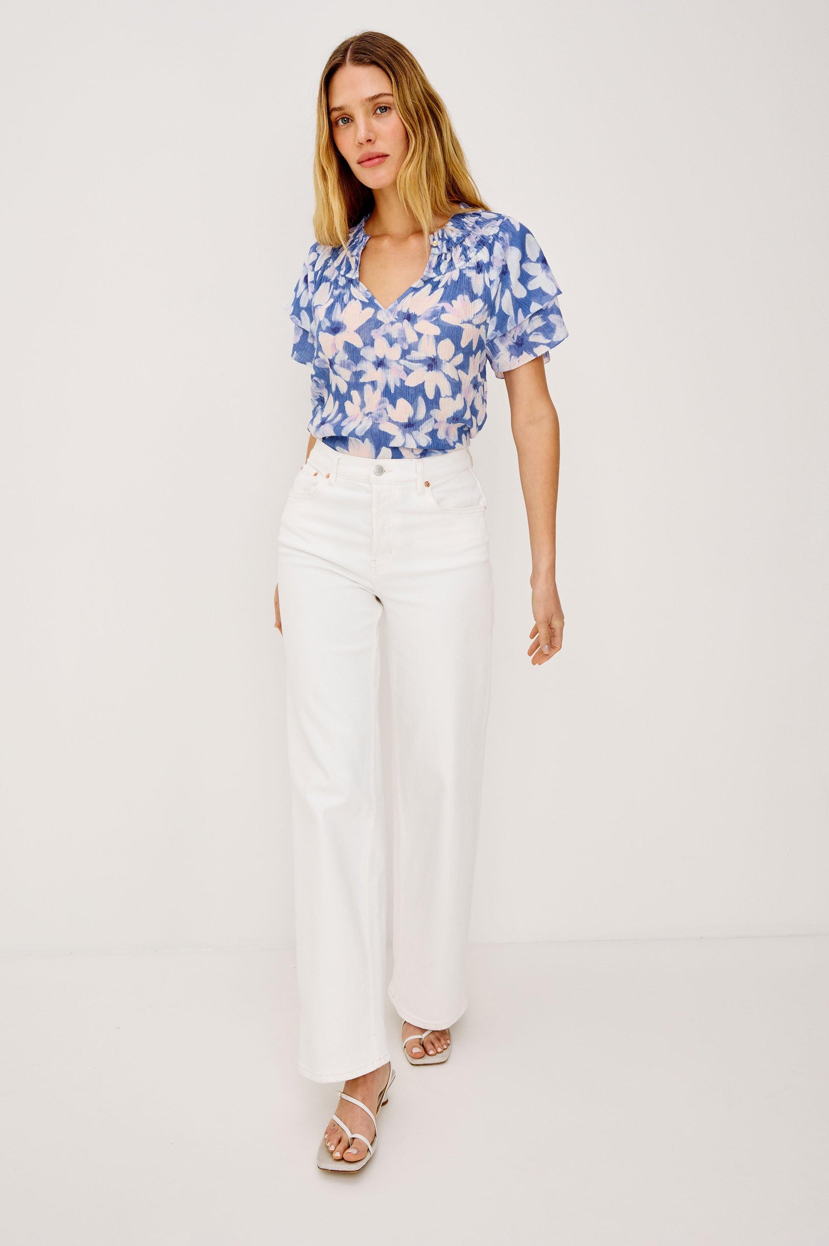 Kamila Top in Chiffon With Elastic Ruffle Collar, V-Neck, and Tiered Flutter Sleeves in Blue Amaranth Colorway - Upper Body Front View Featured on Model