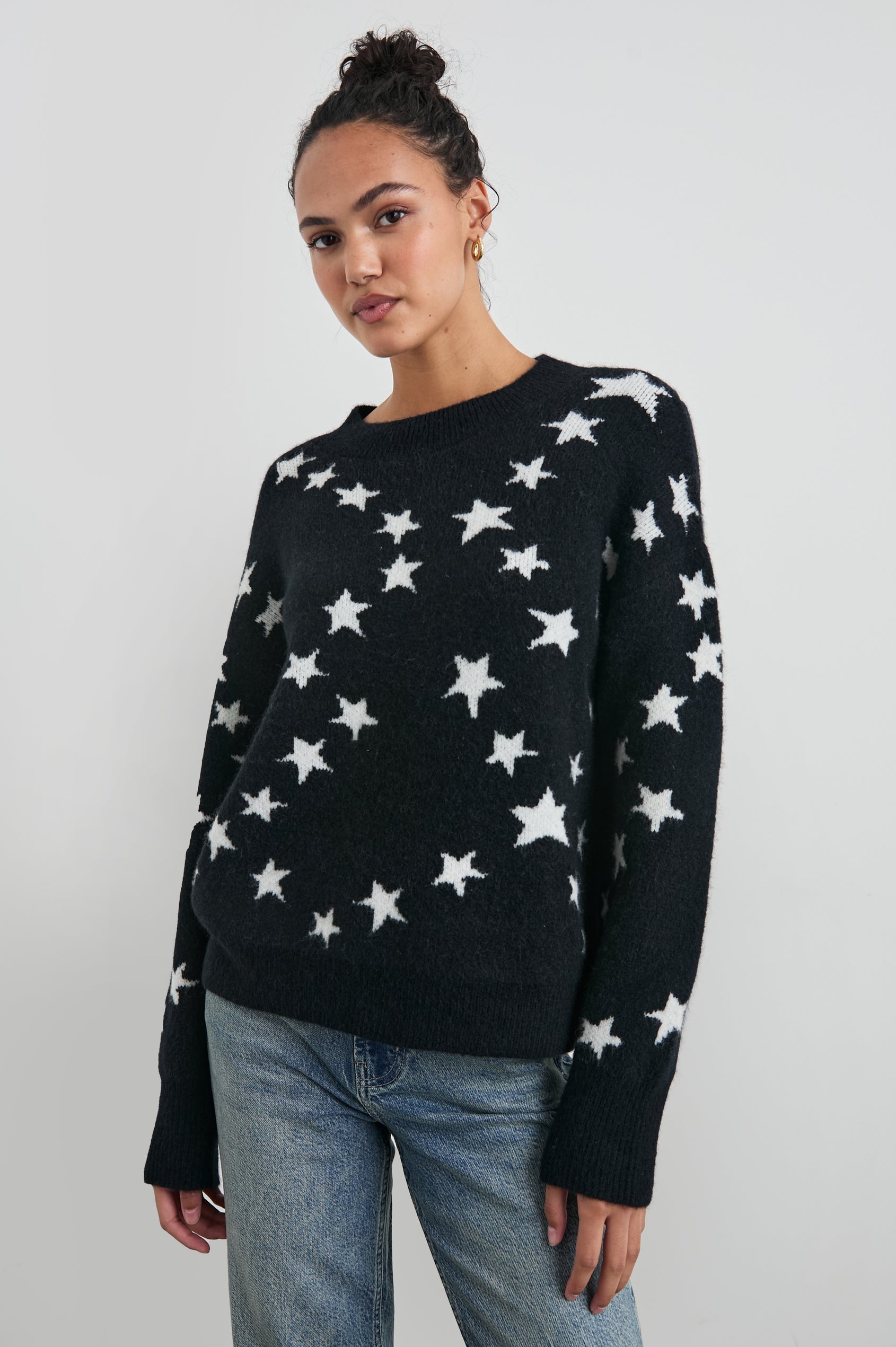 Kana Long-Sleeve Sweater with a Crew Neck in Star Chain Colorway, White Stars on Black - Front View Featured on Model 