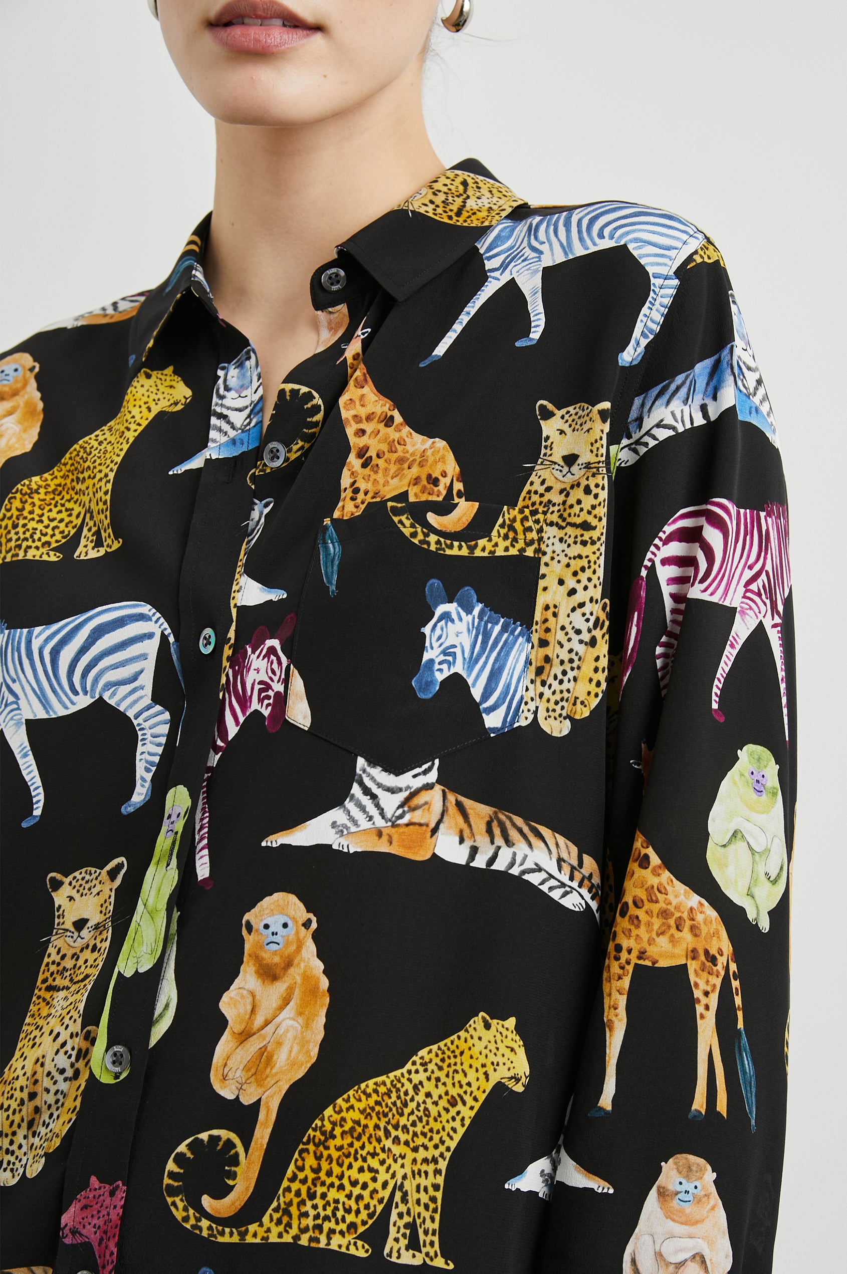 Kate Long Sleeve Button up with a Chest Patch Pocket in Illustrated Animals Colorway, Wild Animals on Black - Front View Featured on Model