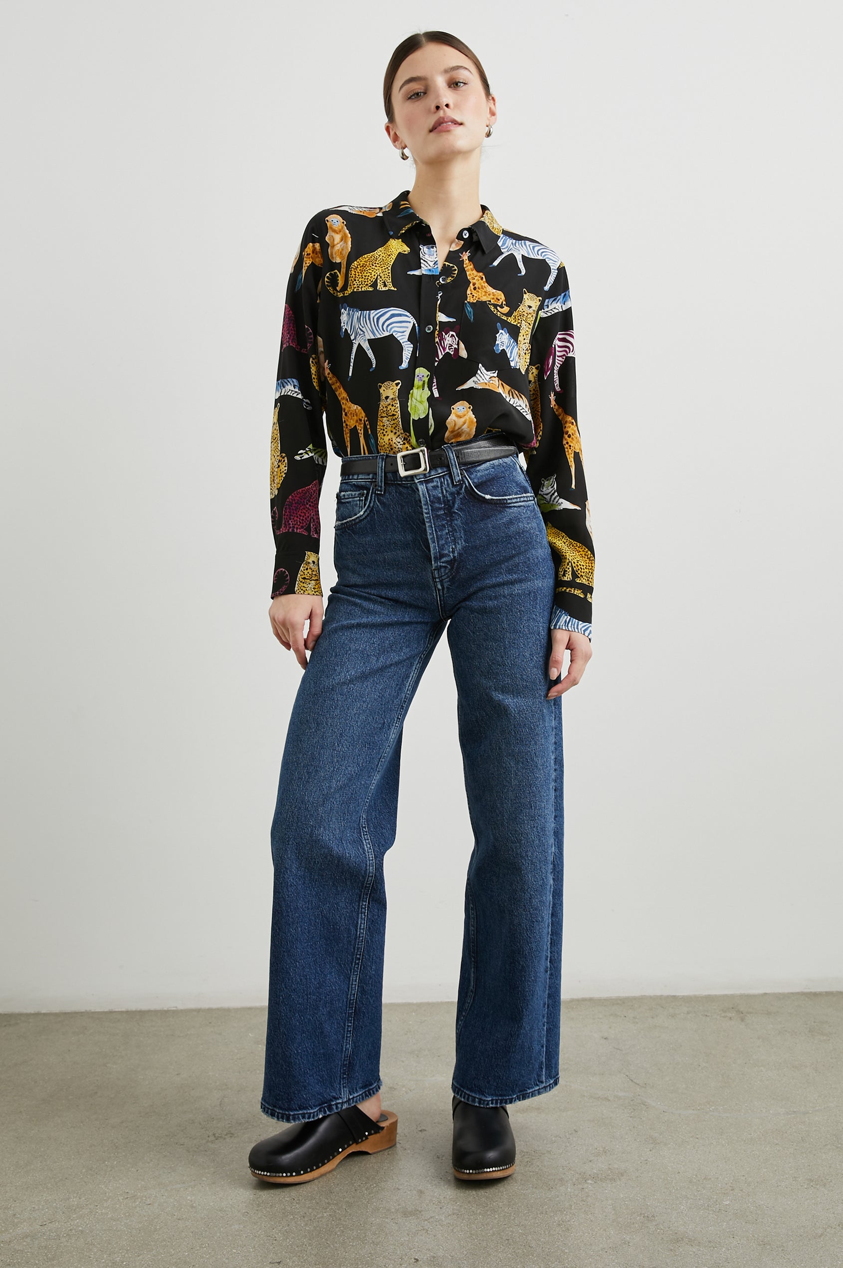 Kate Long Sleeve Button up with a Chest Patch Pocket in Illustrated Animals Colorway, Wild Animals on Black - Front Tucked Full Body View Featured on Model