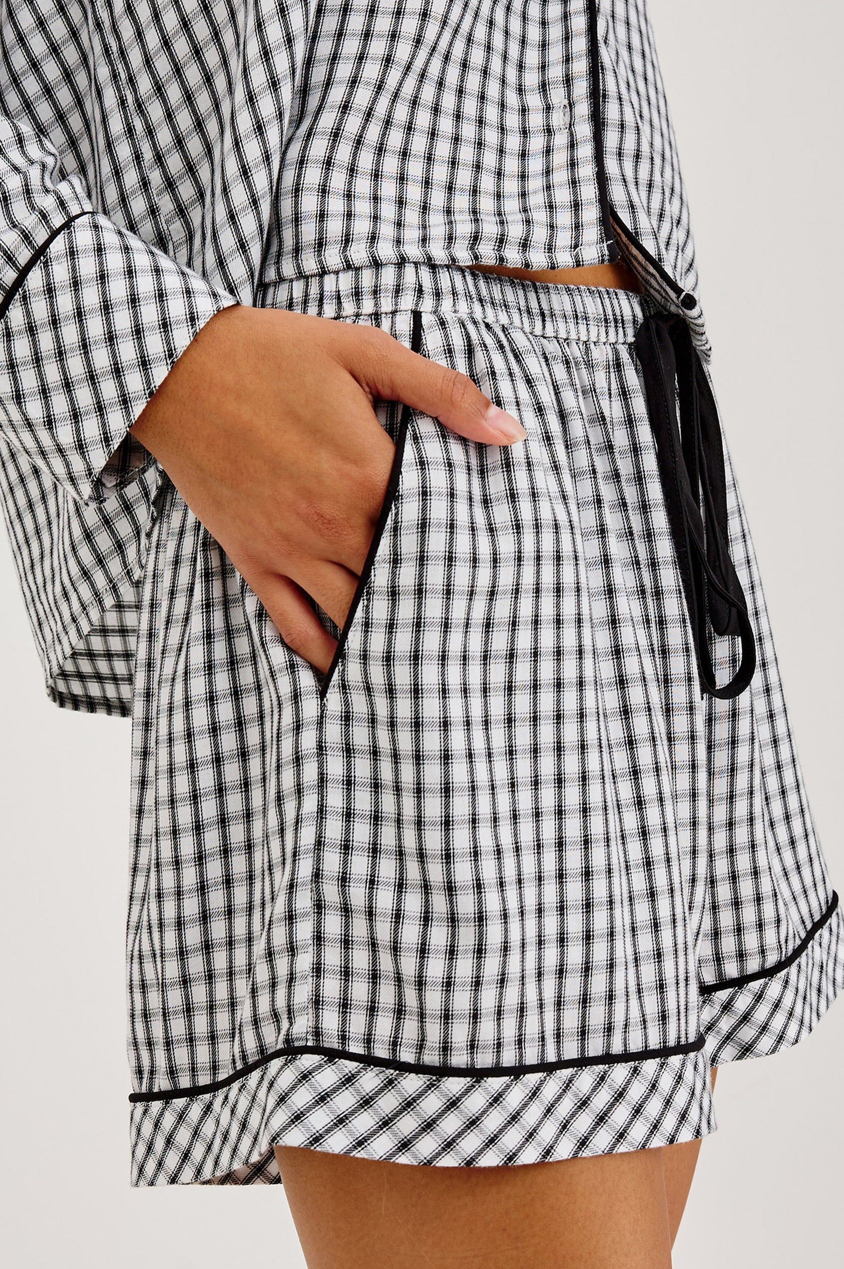 Kellen Pajama Set in Signature Rayon With Piping, Button-Up Shirt, Matching Pants, and Relaxed Fit in Cloud Stripe Colorway - Lower Body Close Up Side View Featured on Model