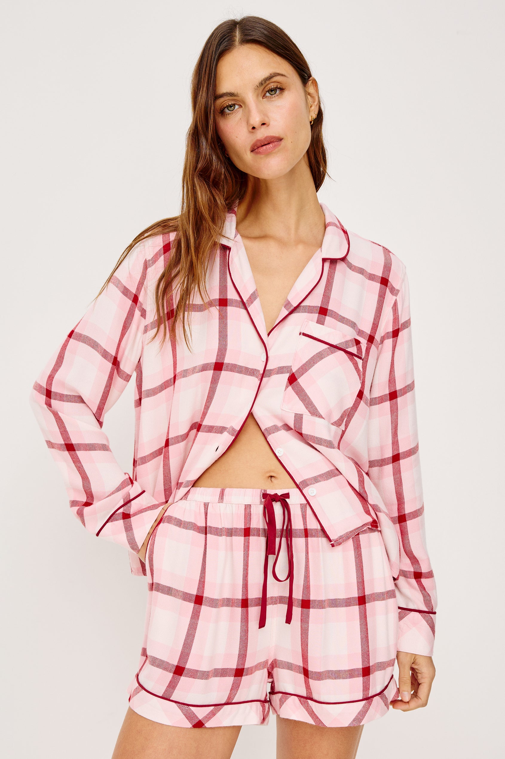 Kellen Pajama Set in Signature Rayon With Relaxed Long Sleeve Button-Up Shirt With Notched Collar and Matching High-Waisted Shorts With Adjustable Drawstring Ties in Pink Cherry Plaid Colorway - Upper Body Front View Featured on Model