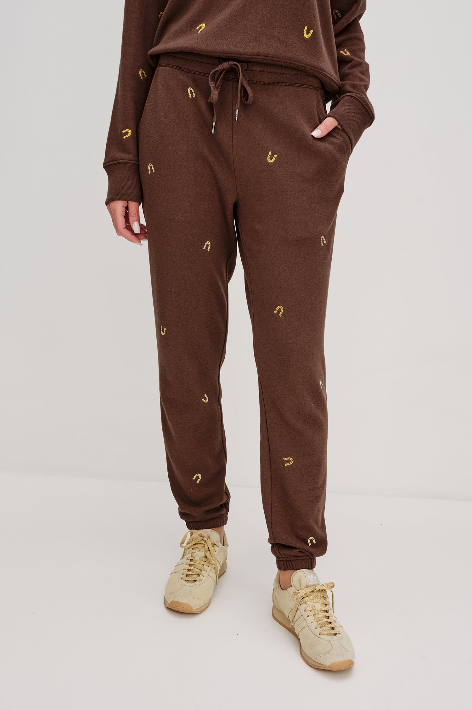Kingston Pants with Elastic Cuffs and Waist with Drawcord in Horseshoe embroidery colorway in Brown - Front View Featured on Model