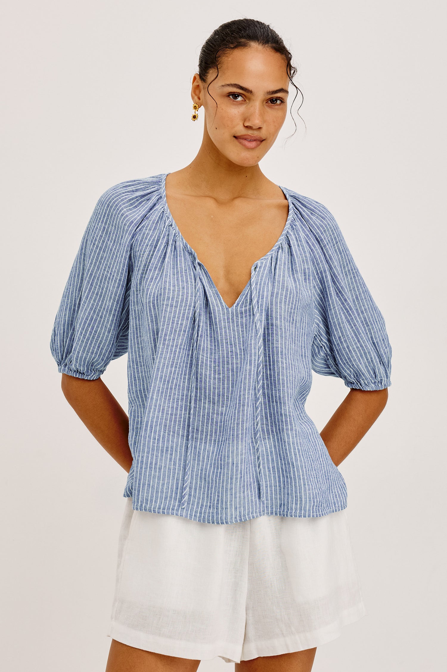 Kirstie Linen Top With Wide Scoop Neckline and Self-Ties, Elbow-Length Raglan Sleeves With Elastic Cuffs, and Loose Fit in Barletta Stripe Colorway - Upper Body Front View Featured on Model