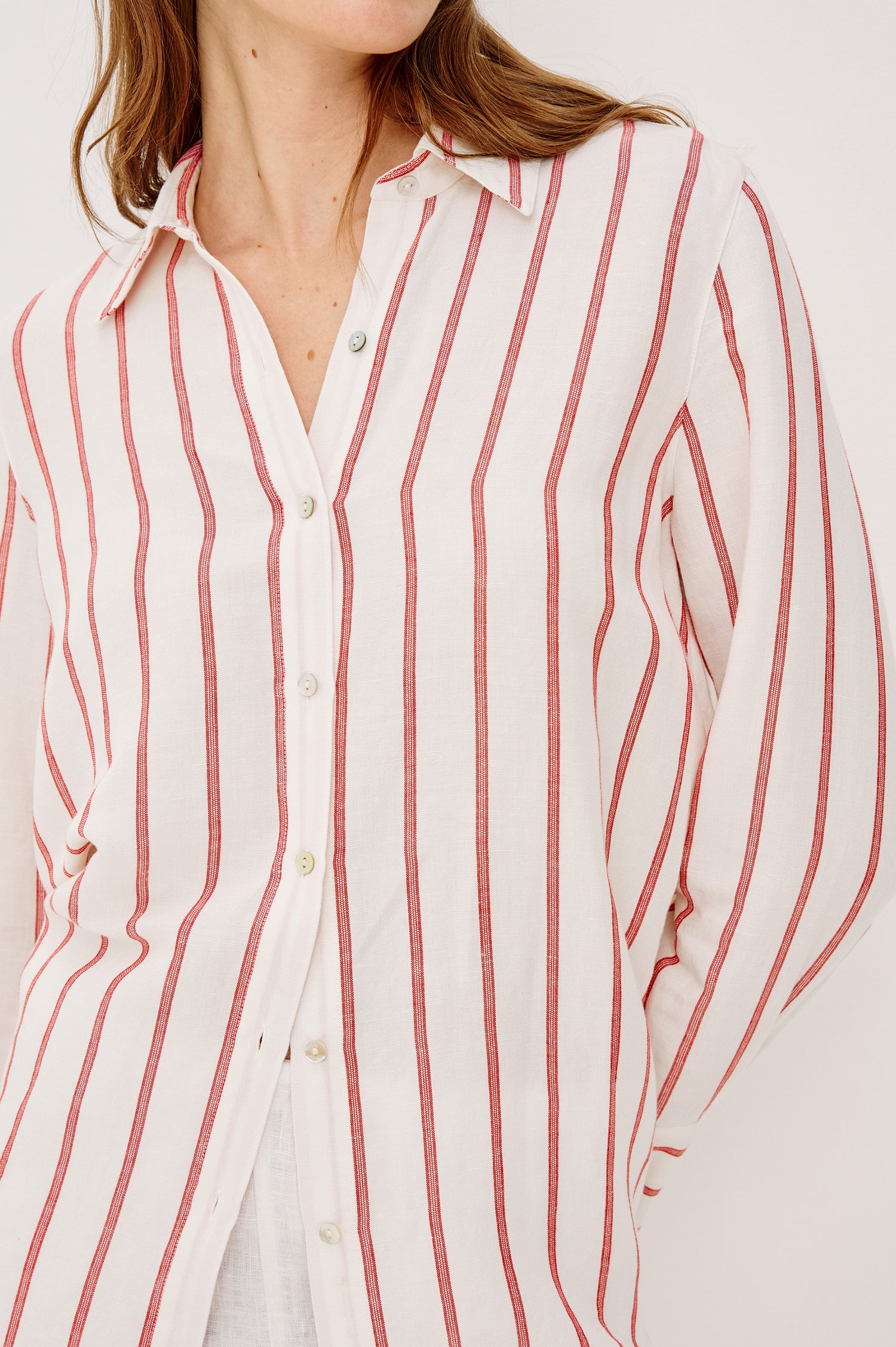 Knox Button-Up Shirt in Linen Viscose With Collar Front Buttons Long Sleeves and Relaxed Fit in Scarlet Ivory Stripe Colorway - Upper Body Close Up View Featured on Model