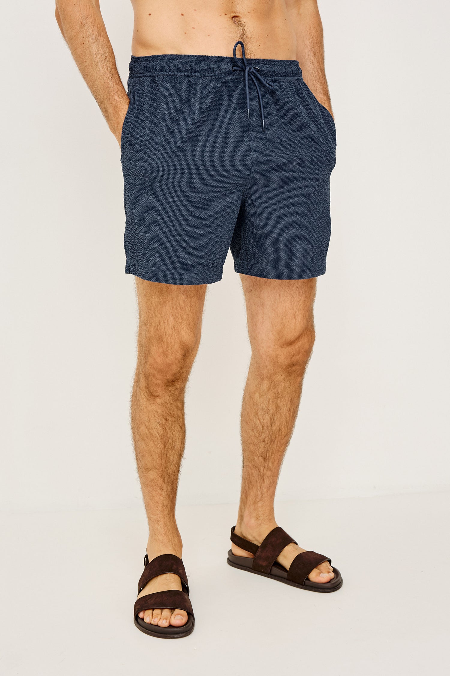 La Brea Swim Short in Stretch Polyester Seersucker With Adjustable Drawstring Waist Ties in Stratos Colorway - Lower Body Front View Featured on Model