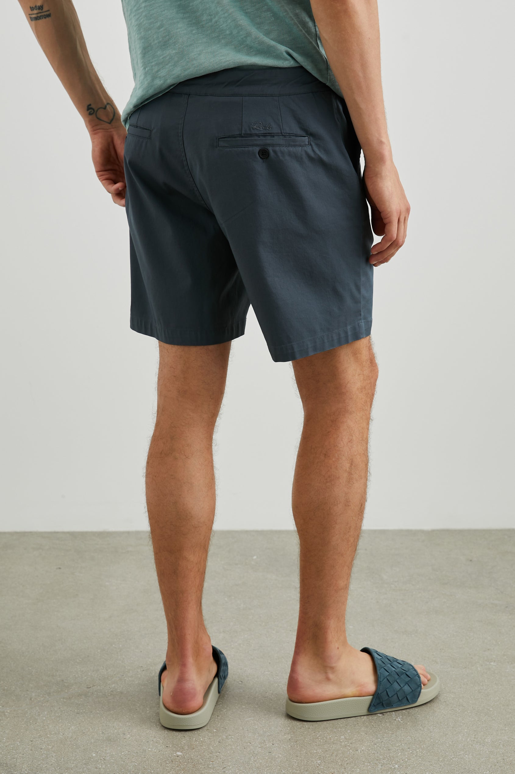 Laguna cotton lid-length short with front button closure - back view on model