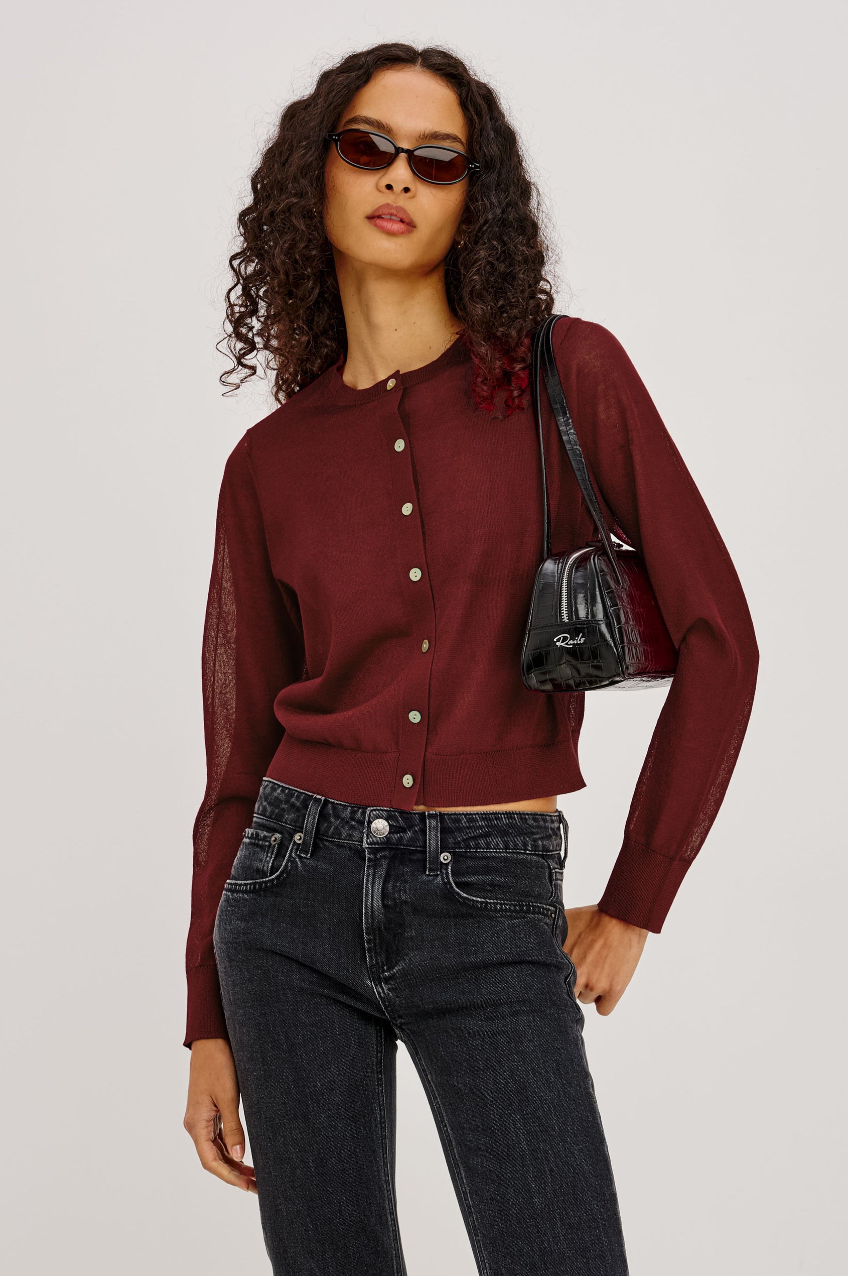 Lakelyn Cardigan in Sheer Fine-Gauge Knit With Slightly Cropped, Boxy Fit, Crew Neck, Front Button Closures, and Long Sleeves in Crimson Colorway - Upper Body Front View Featured on Model