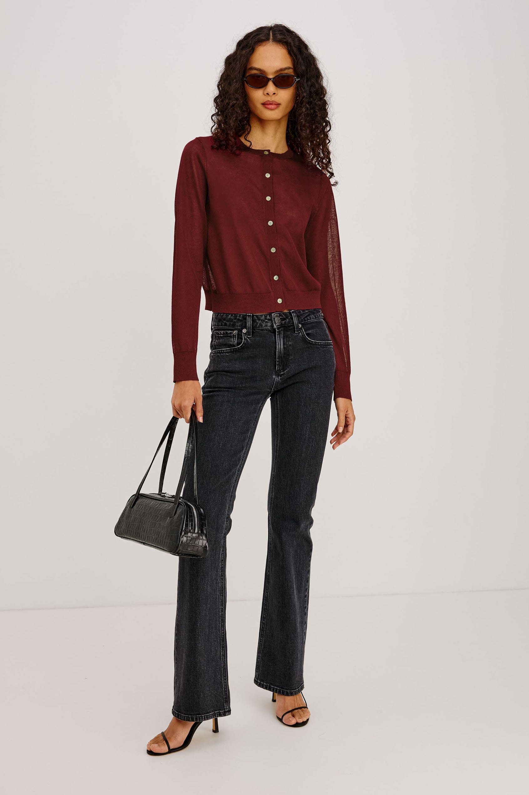 Lakelyn Cardigan in Sheer Fine-Gauge Knit With Slightly Cropped, Boxy Fit, Crew Neck, Front Button Closures, and Long Sleeves in Crimson Colorway - Full Body Front View Featured on Model