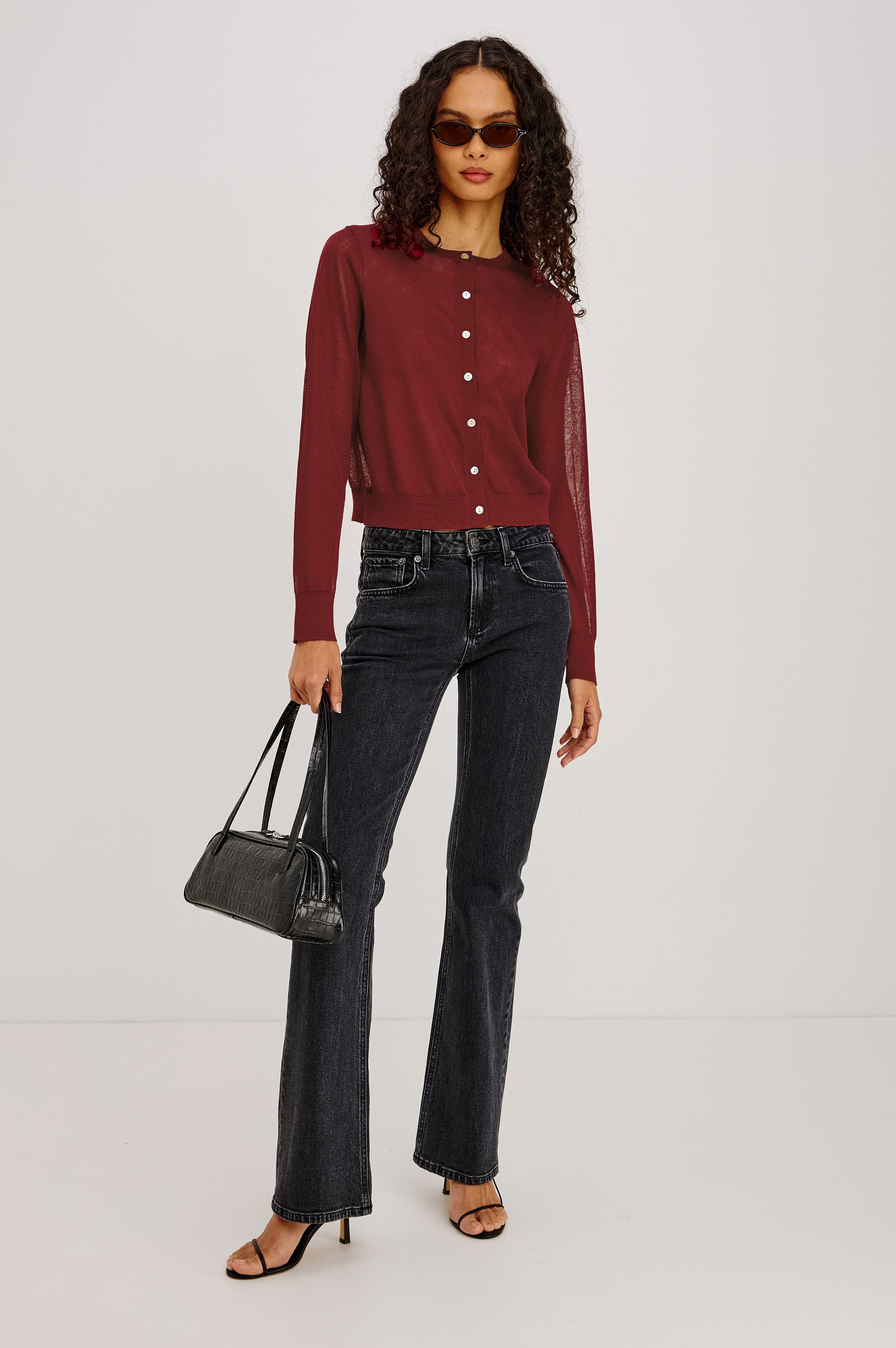 Lakelyn Cardigan in Sheer Fine-Gauge Knit With Slightly Cropped, Boxy Fit, Crew Neck, Front Button Closures, and Long Sleeves in Crimson Colorway - Full Body Front View Featured on Model
