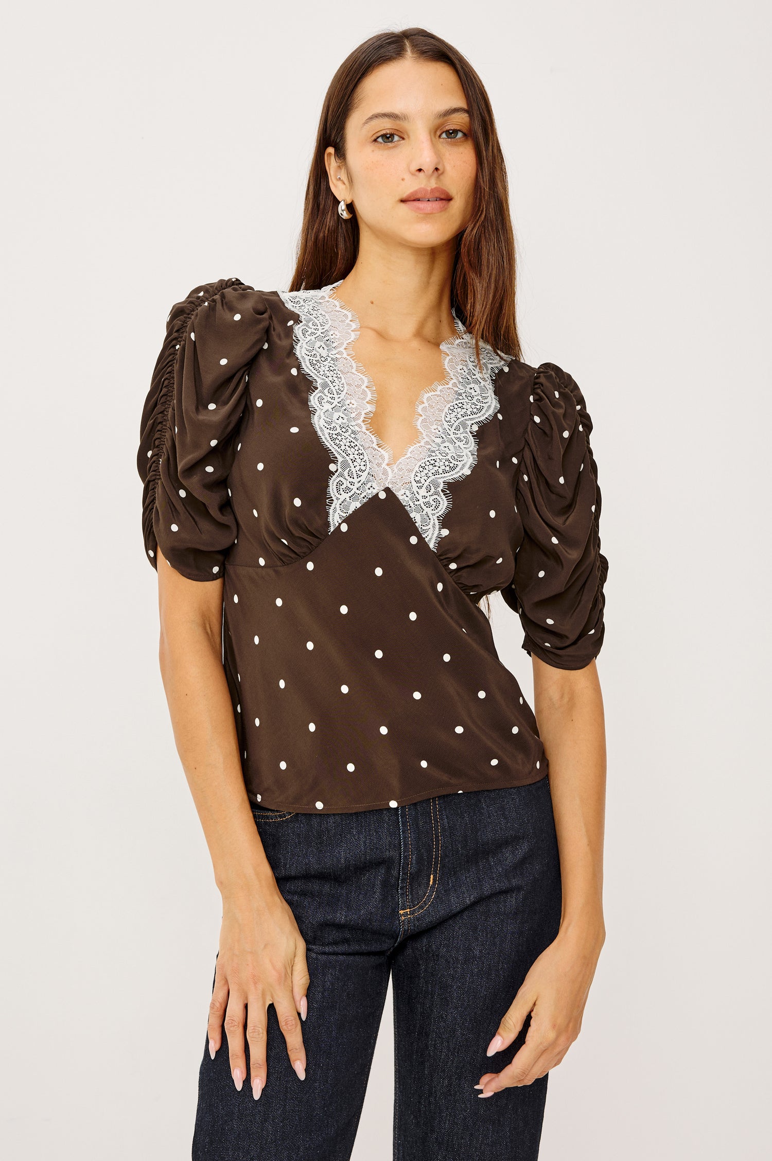 Lazara Top in Crepe With Lace Trim V-Neckline and Three-Quarter Puff Sleeves With Ruching in Cocoa Polka Dots Colorway - Upper Body Front View Featured on Model