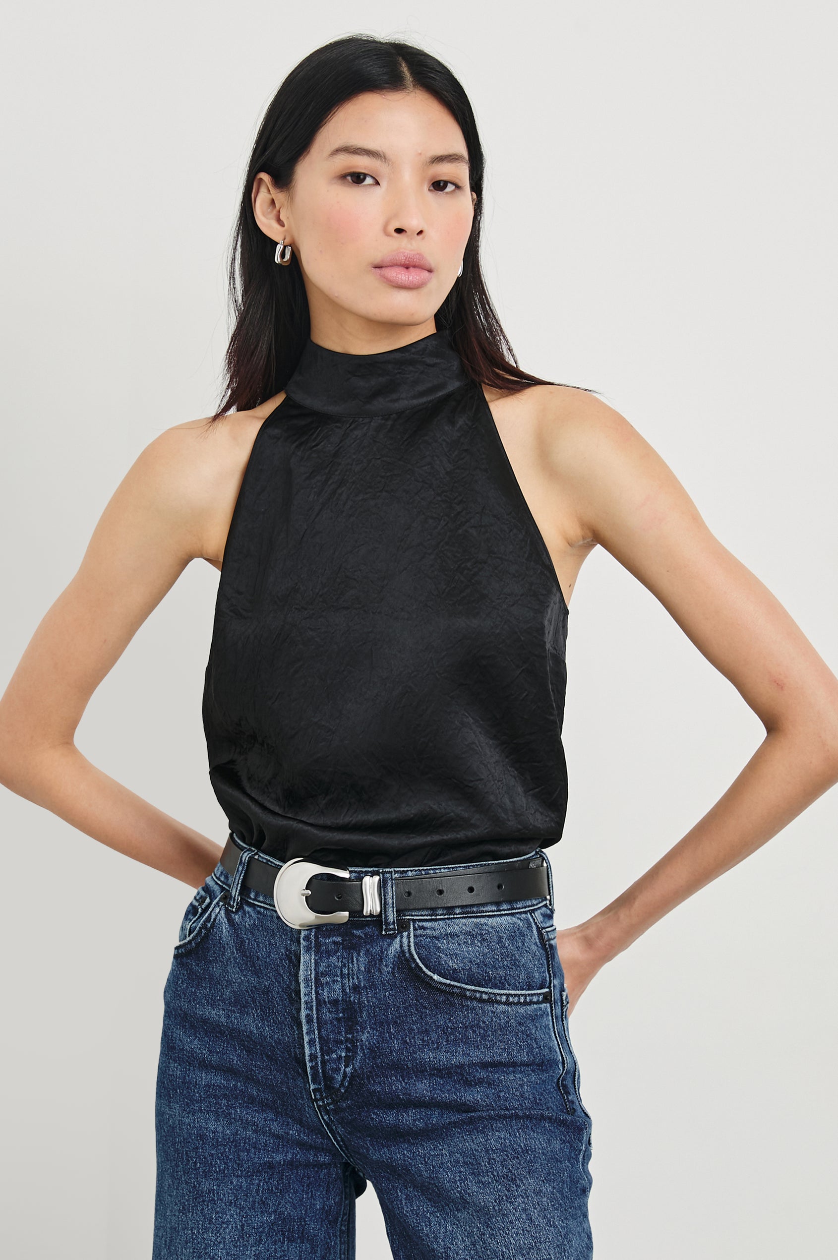 Leah Top with High Neck Halter Top with Back Button Closure in Black Crinkle Colorway - Front Tucked View Featured on Model