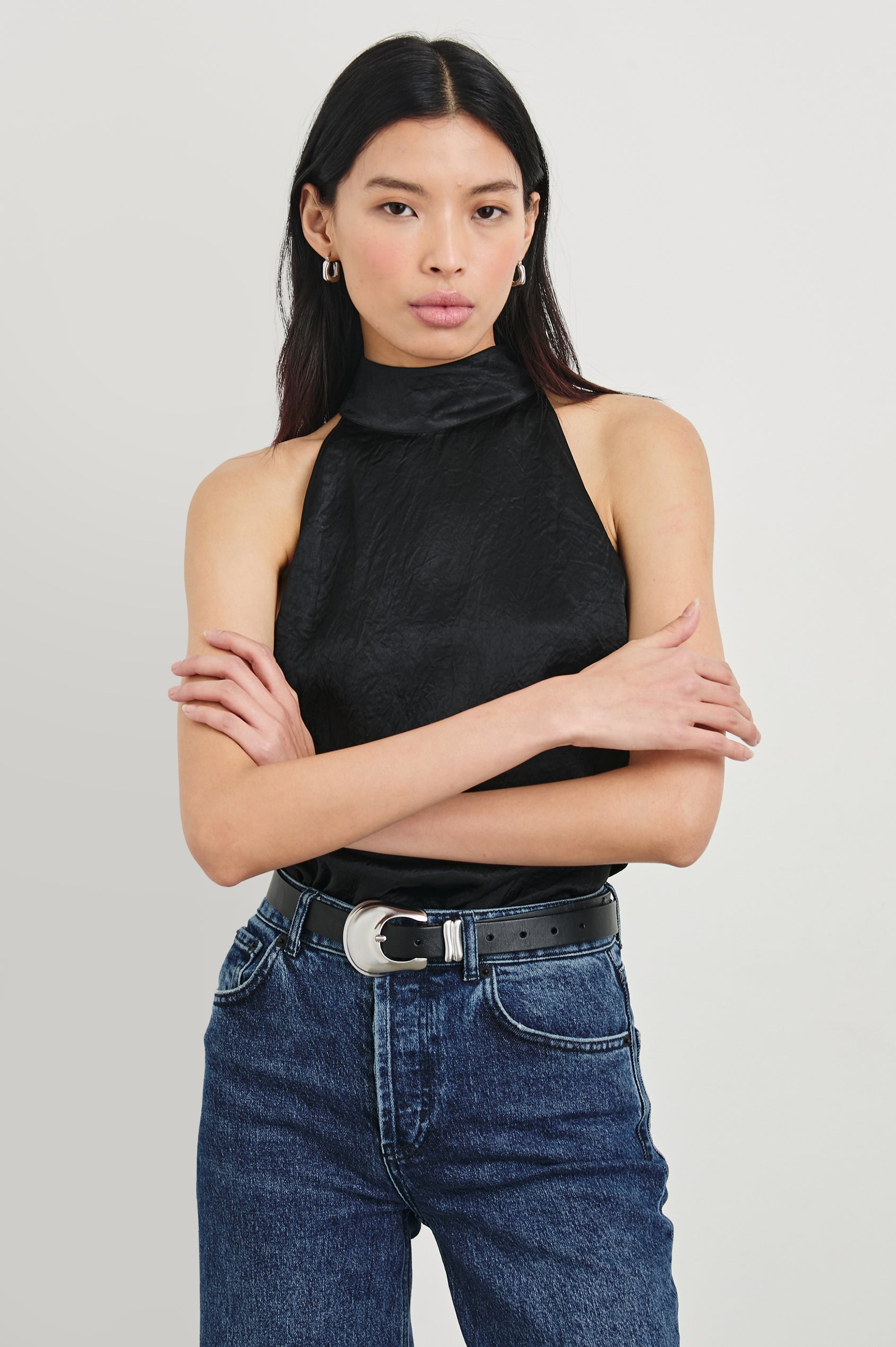 Leah Top with High Neck Halter Top with Back Button Closure in Black Crinkle Colorway - Front Tucked View Featured on Model