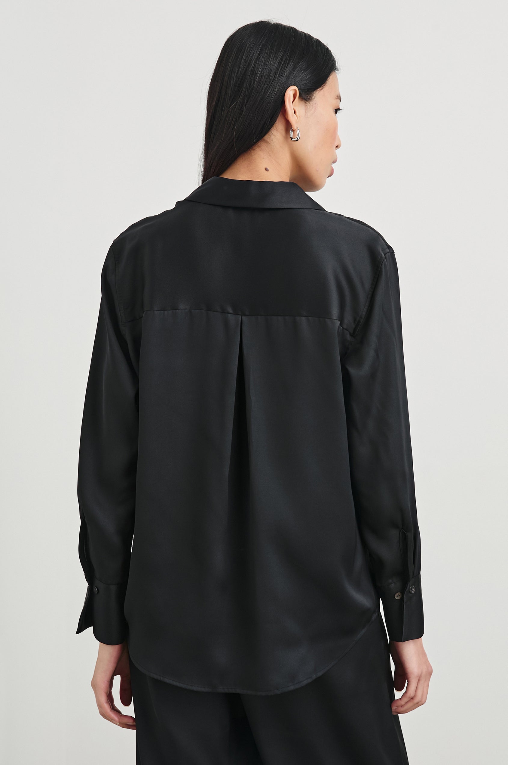 Ledger Long-Sleeve Button Down in Black Colorway - Back View Featured on Model