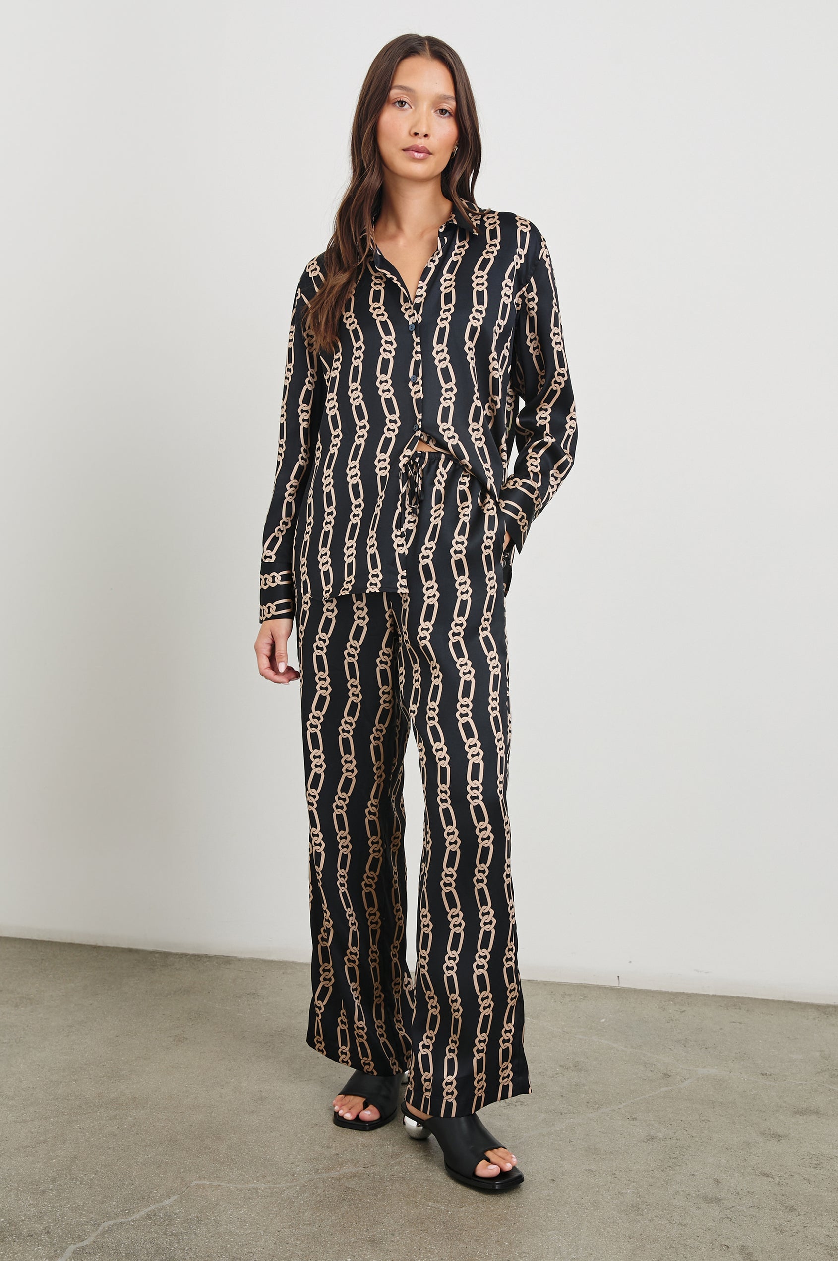 Ledger Long-Sleeve Button Down in Black Gold Link Colorway, vertical gold links on black - Front Full Body View Featured on Model