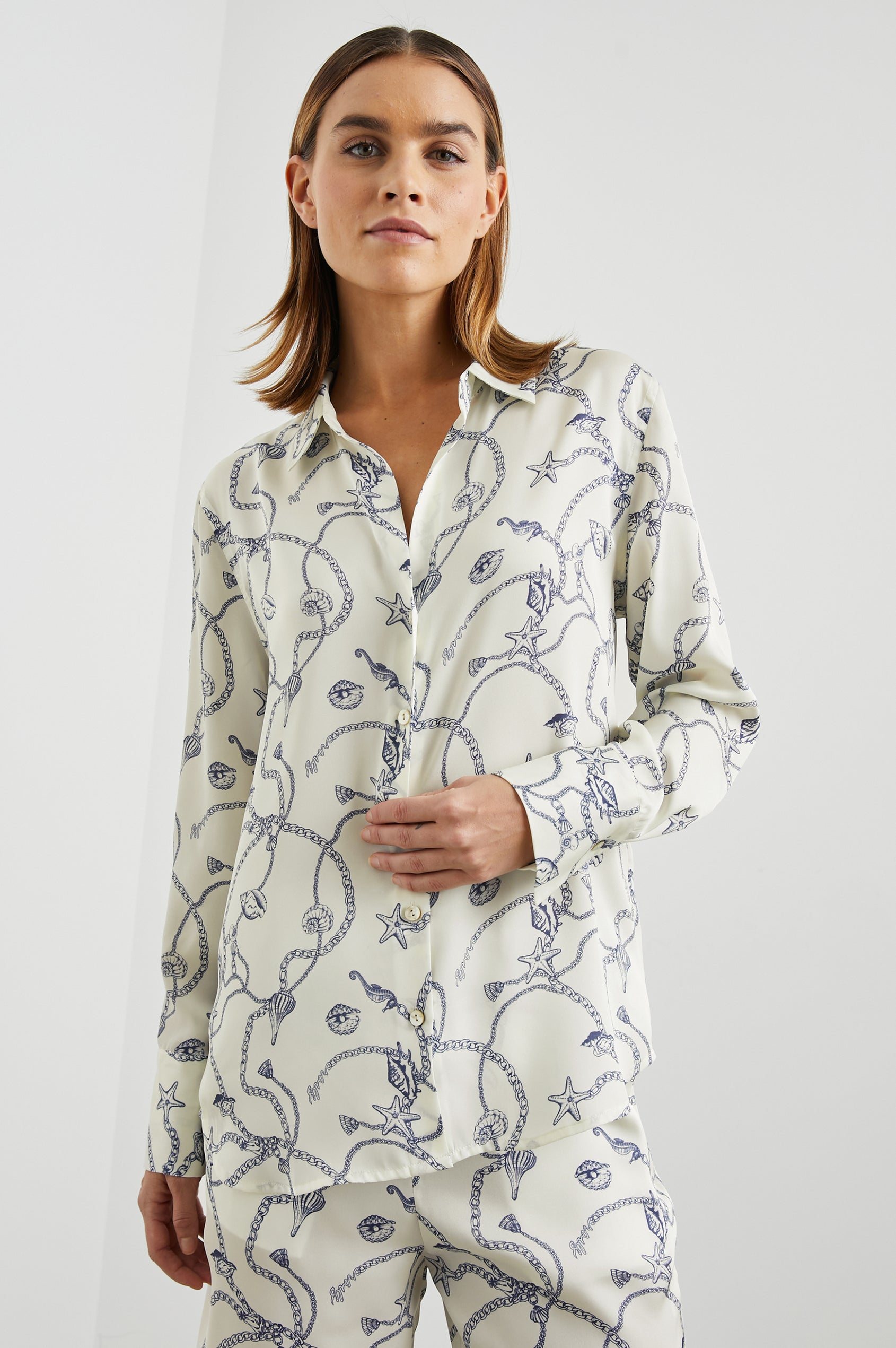 Ledger Long-Sleeve Button Down in Nautical Chain Colorway, a blue nautical design on ivory - Front View Featured on Model