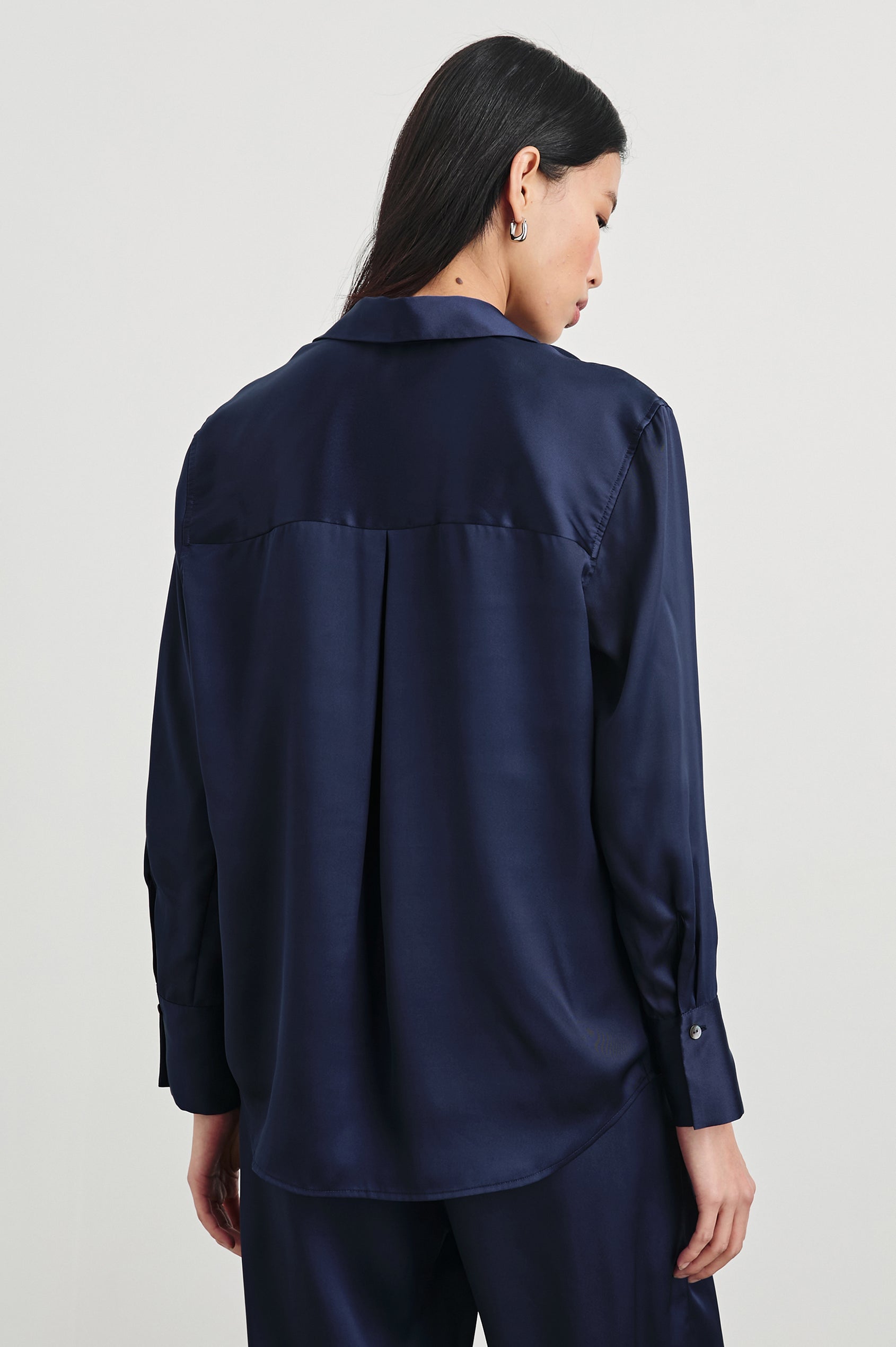 Ledger Long-Sleeve Button Down in Navy Colorway - Back View Featured on Model
