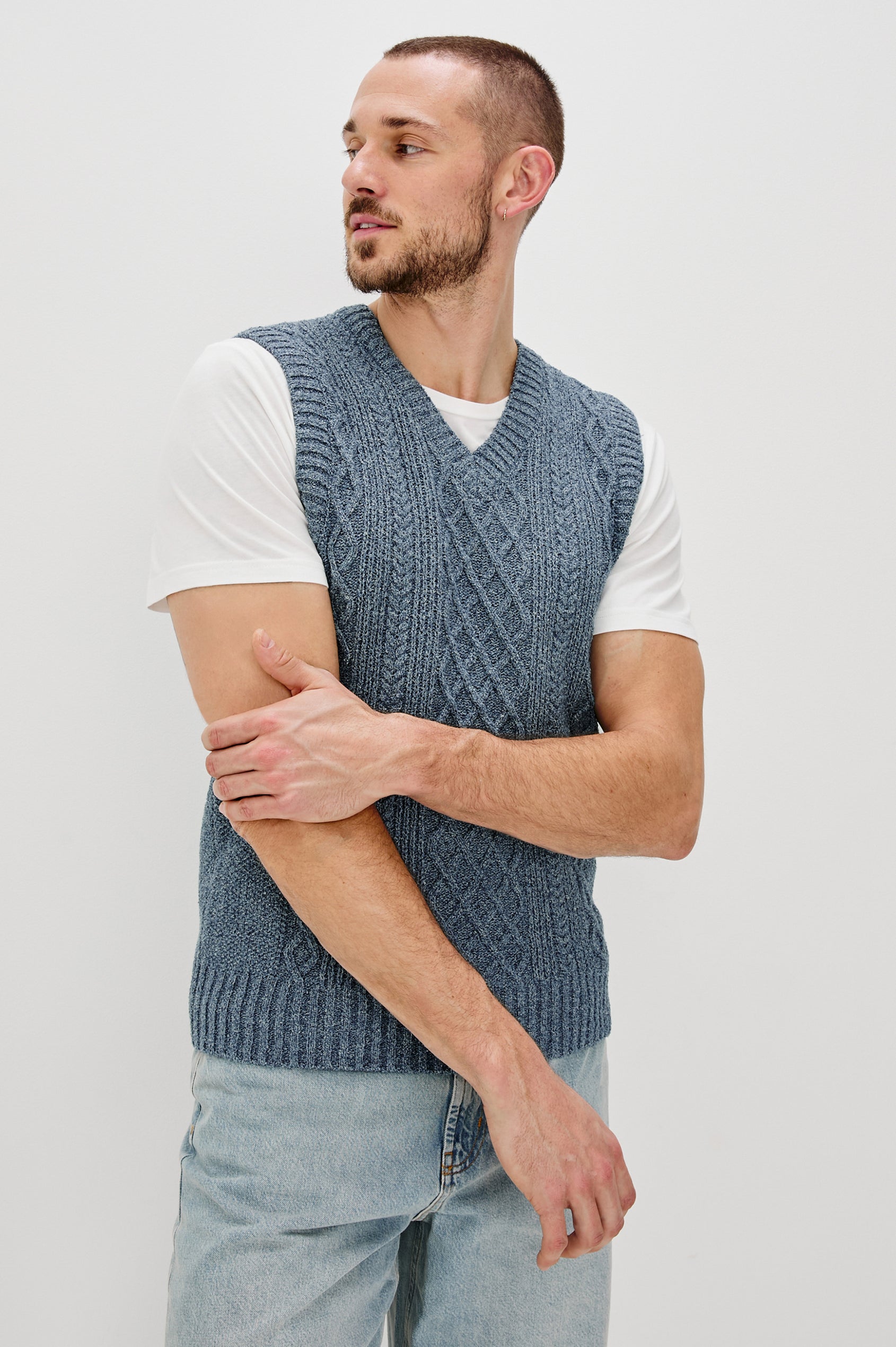 Lee V-Neck Sweater Vest, Cable Knit, Rib Collar, Sleeve Opening and Hem in Azure Marl Colorway. Front View Shown on Model.