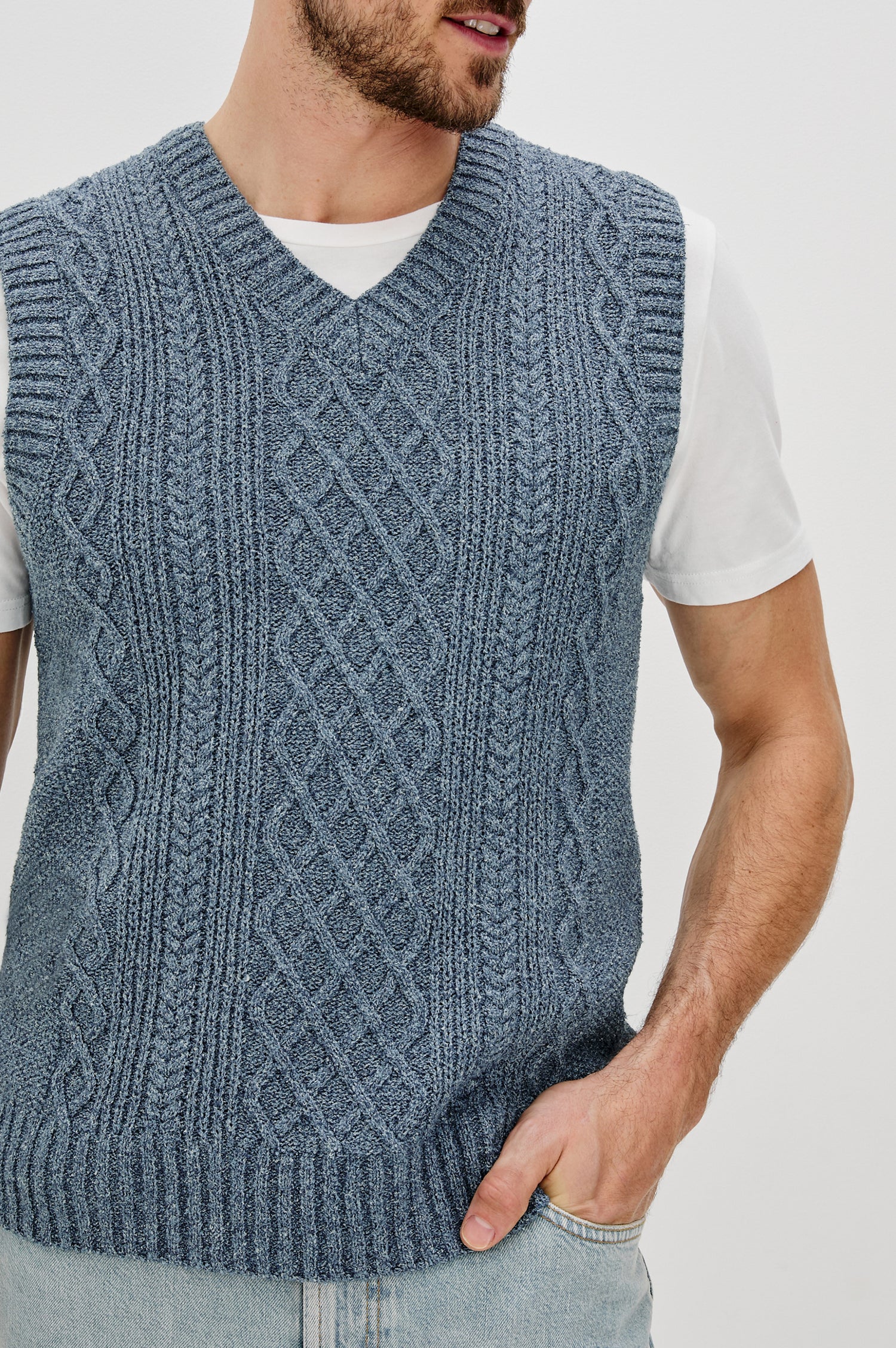 Lee V-Neck Sweater Vest, Cable Knit, Rib Collar, Sleeve Opening and Hem in Azure Marl Colorway. Front Detail View Shown on Model.