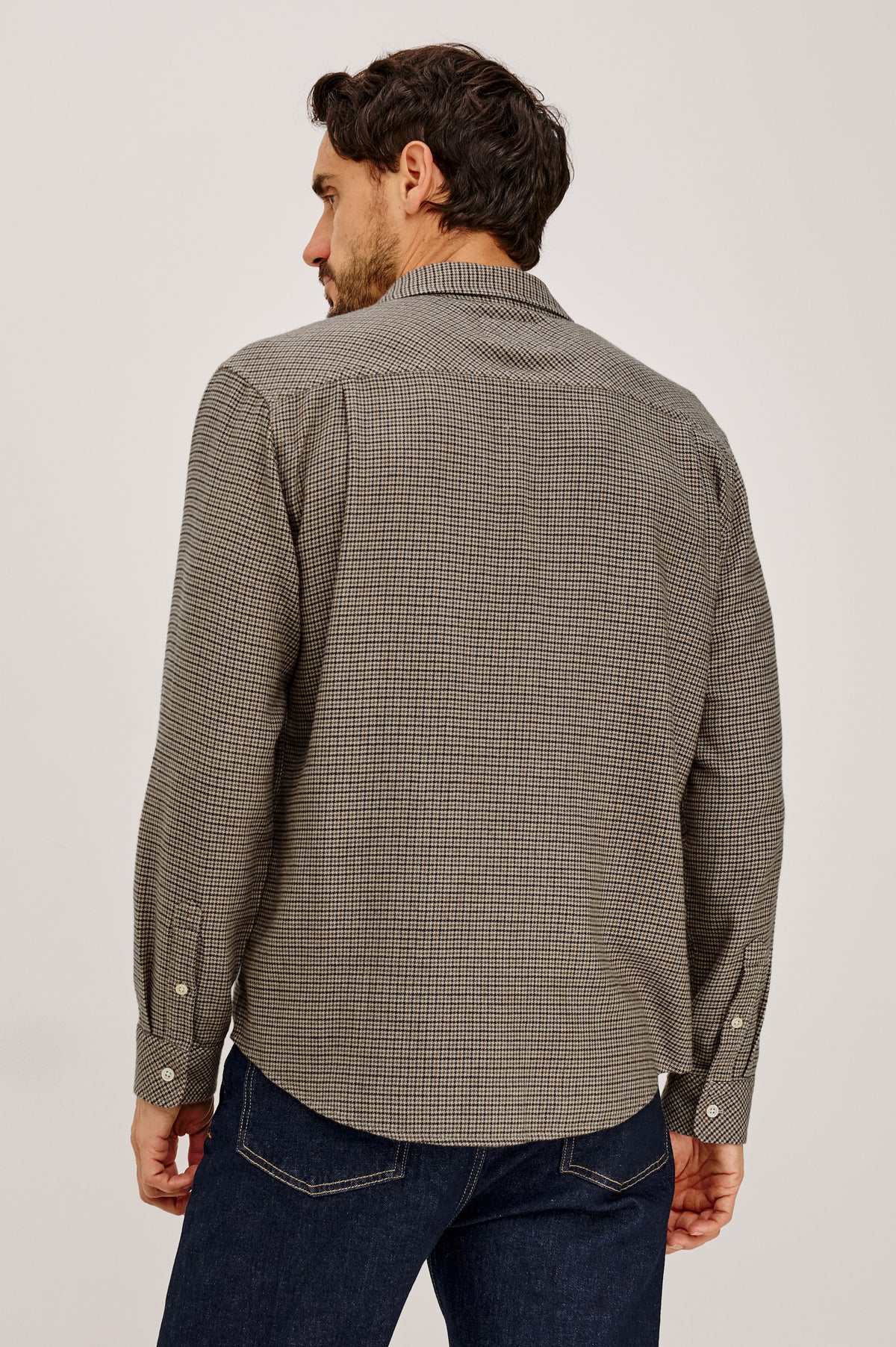 Lennox Shirt in Houndstooth Cotton-Rayon Blend With Front Buttons, Single Chest Pocket, Point Collar, and Long Sleeves in Cotswold Houndstooth Colorway - Upper Body Back View Featured on Model.
