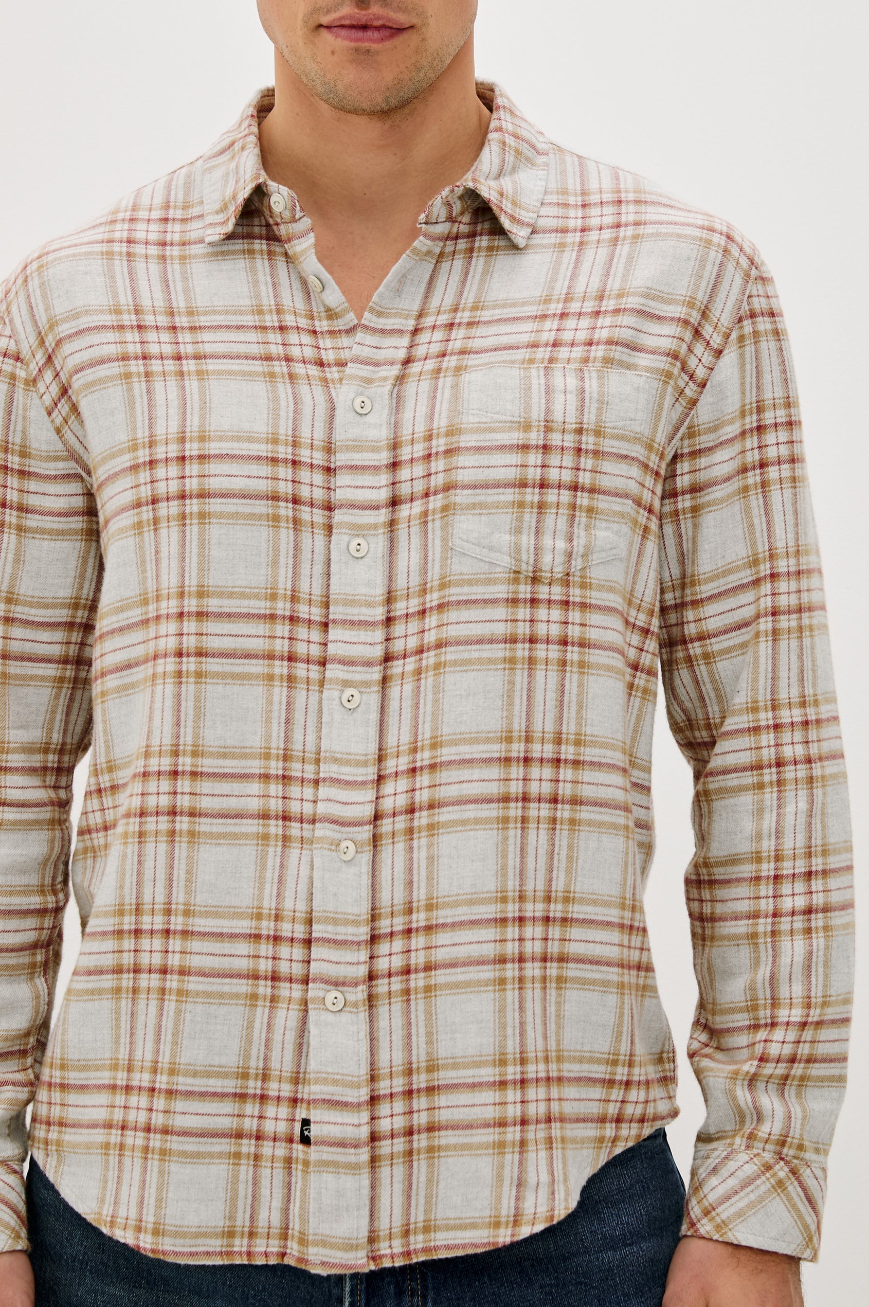Lennox Long-Sleeve Button Up with a Chest Patch Pocket in Currant Tawney Melange Colorway, a plaid wtih Beige, Burnt Orange and gold colors- Front Detail View Featured on model