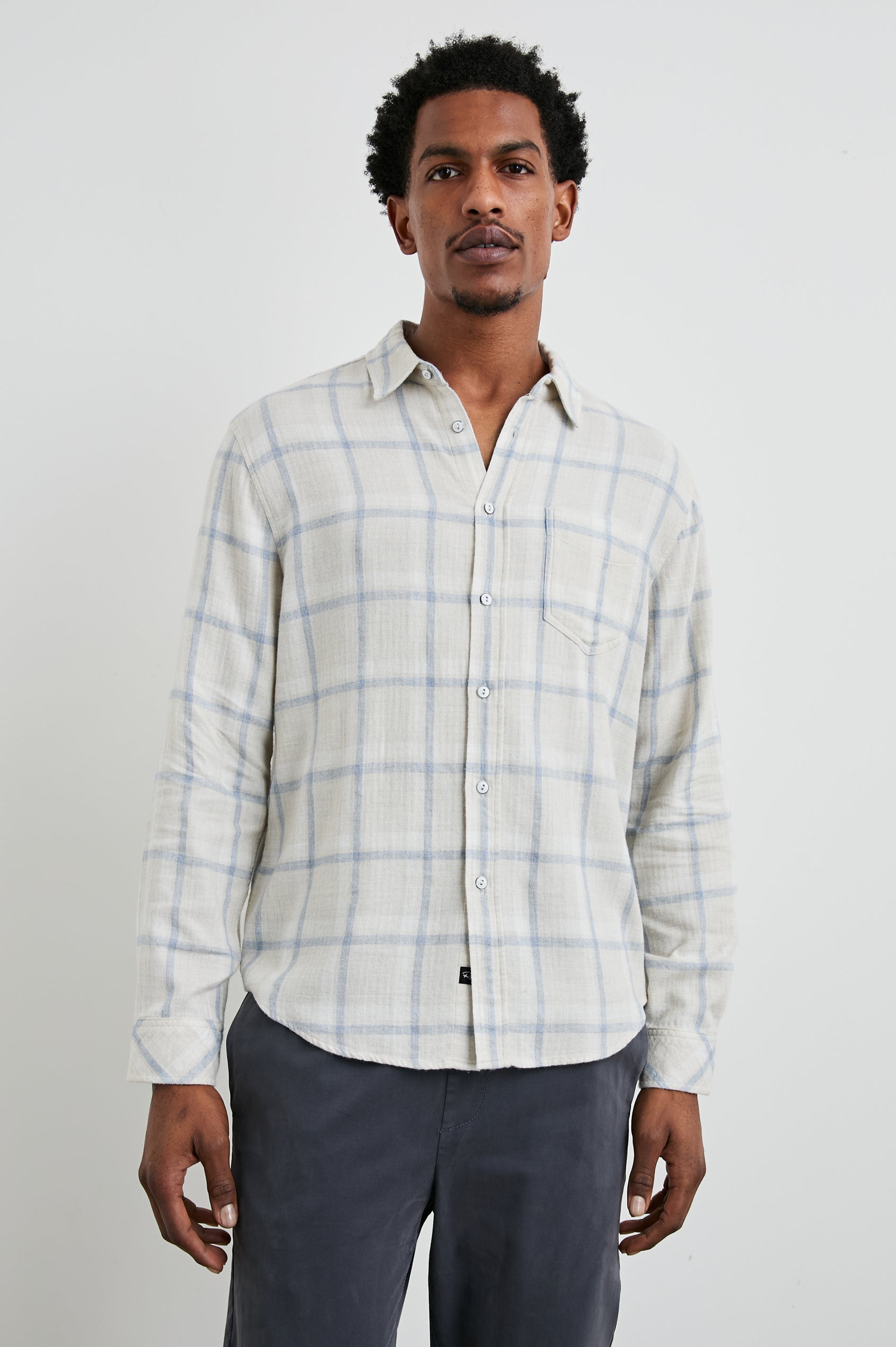 Lennox Long-Sleeve Button Up with a Chest Patch Pocket in Parchment Sky Melange Colorway, a plaid - Front View Featured on Model