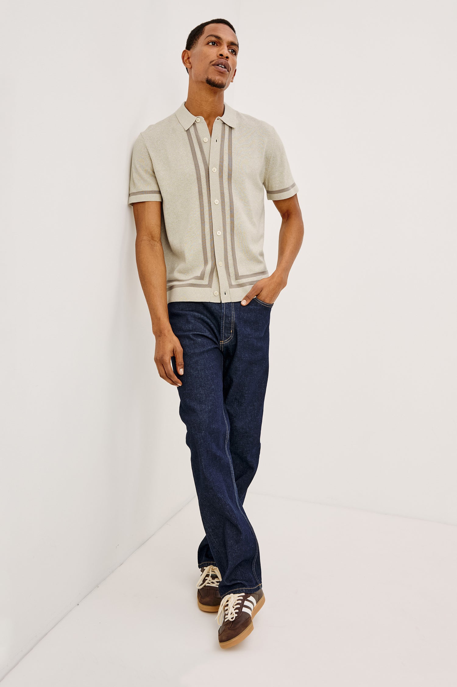 Leo Knit Sweater Polo in Yarn-Dyed Cotton Blend With Collar, Front Buttons, and Short Sleeves in Driftwood Melange Colorway - Full body front View Featured on Model