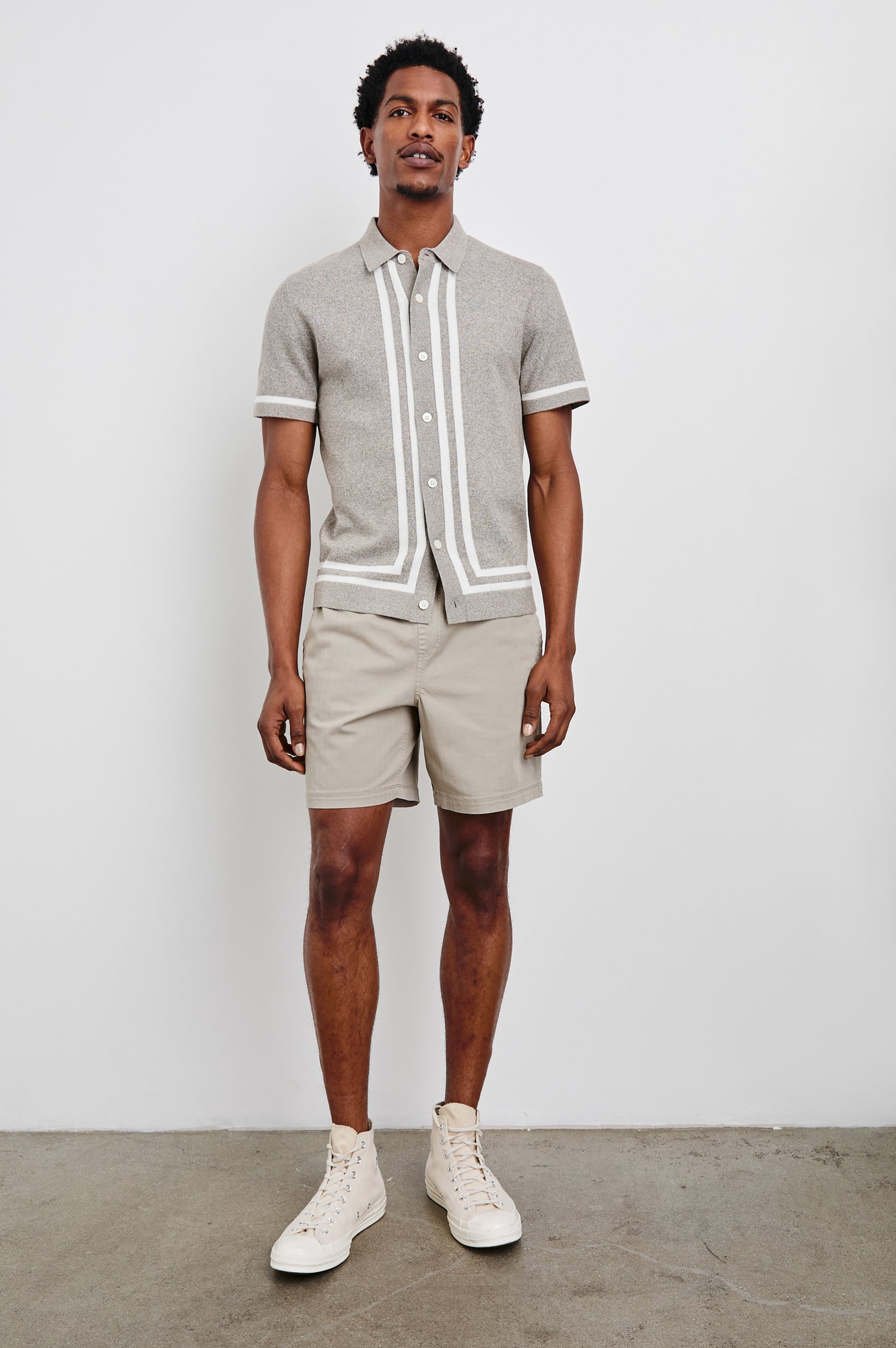 Leo Short-Sleeve Button Up in Oat Grey Melange Colorway, with white bands along the buttons and trim - Front Full Body View Featured on Model