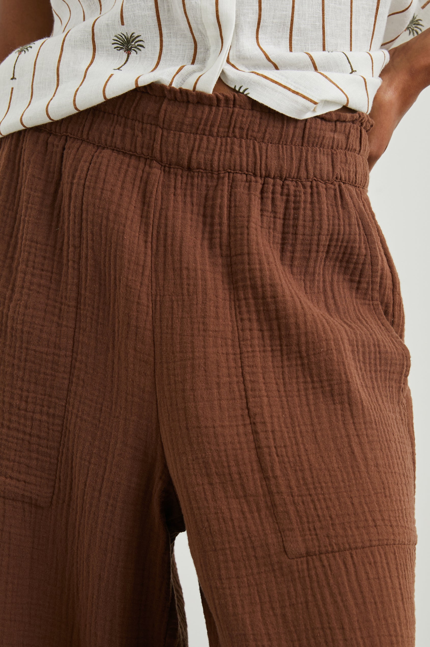 Leon Pant with a Smocked Waistband, Short Side Slits on Outer Leg and Two Front Seam Pockets in Cacao Colorway - Front View Featured on Model