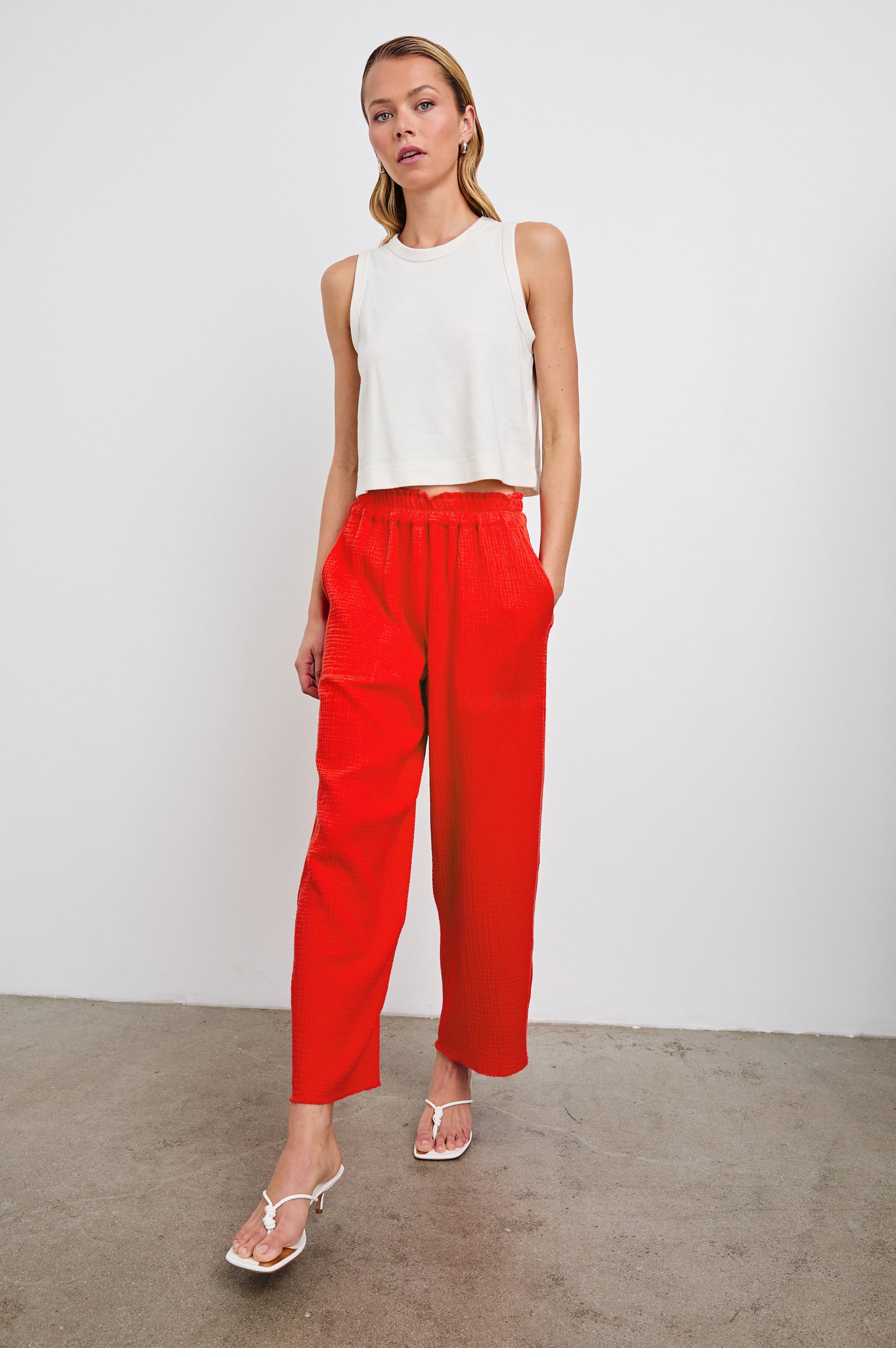Leon Crop Pant with a Smocked Waistband and Two Front Seam Pockets in Cherry Colorway - Front Full Body View Featured on Model