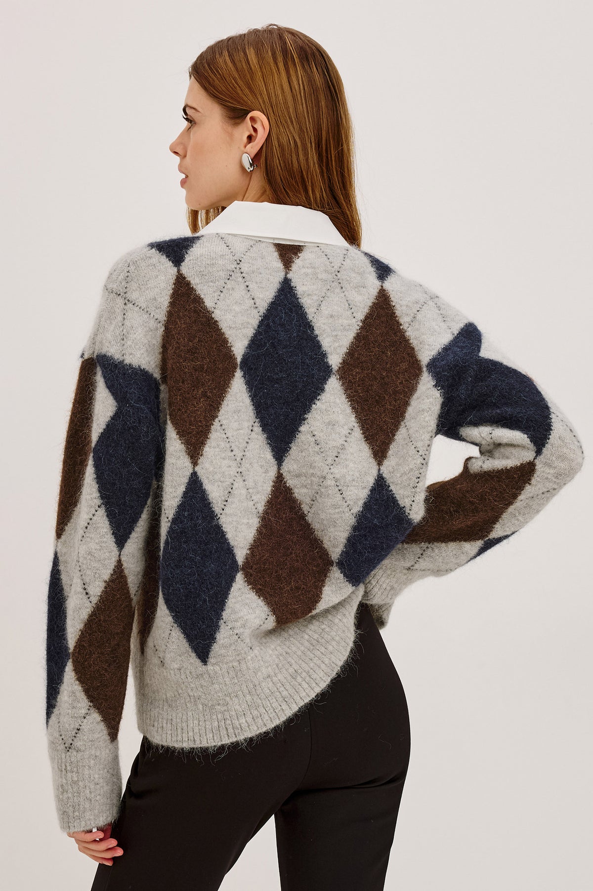 Linda Sweater in Alpaca Blend Knit With Contrast Polo Collar and Button Placket, Slightly Oversized Relaxed Fit, and Ribbed Trim in Cedar Argyle Colorway - Upper Body Back View Featured on Model.