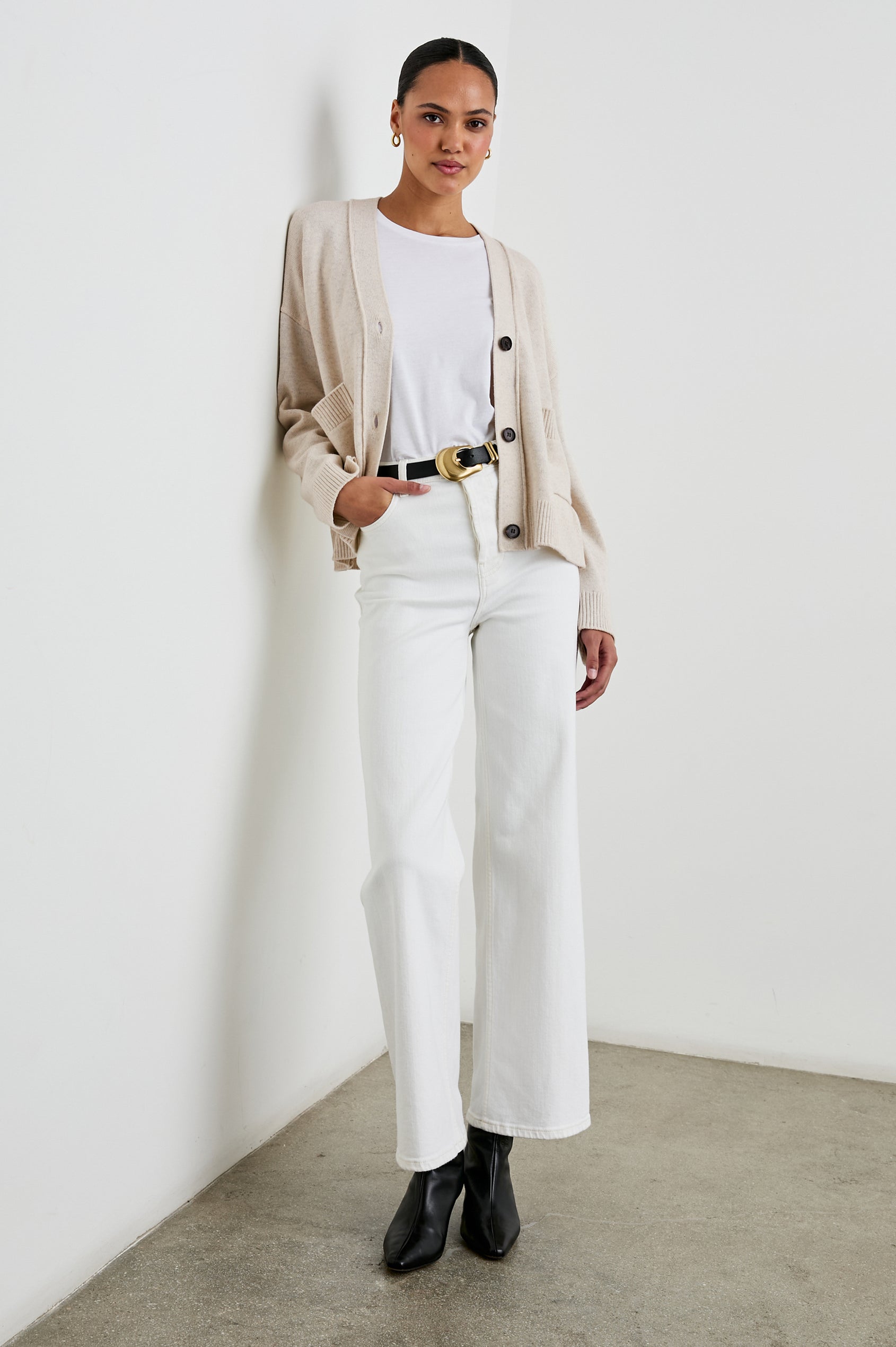 Lindi Long-Sleeve V Neck Cardigan with Three Button Closure, Two Front Patch Pockets and Ribbed Trim in Oatmeal Colorway - Front Full Body View Featured on Model