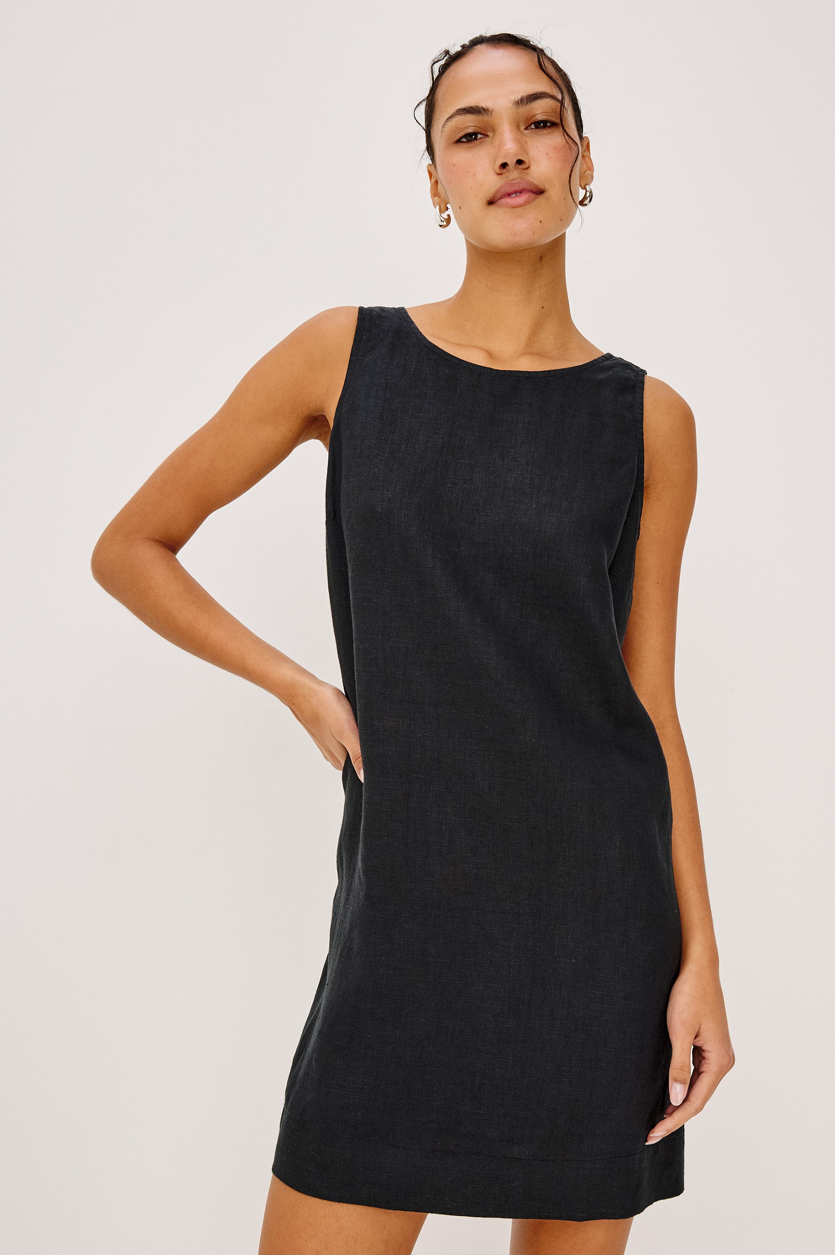 Lindsey Sleeveless Scoop Neck Mini Dress in Black Colorway. Front View Shown on Model.