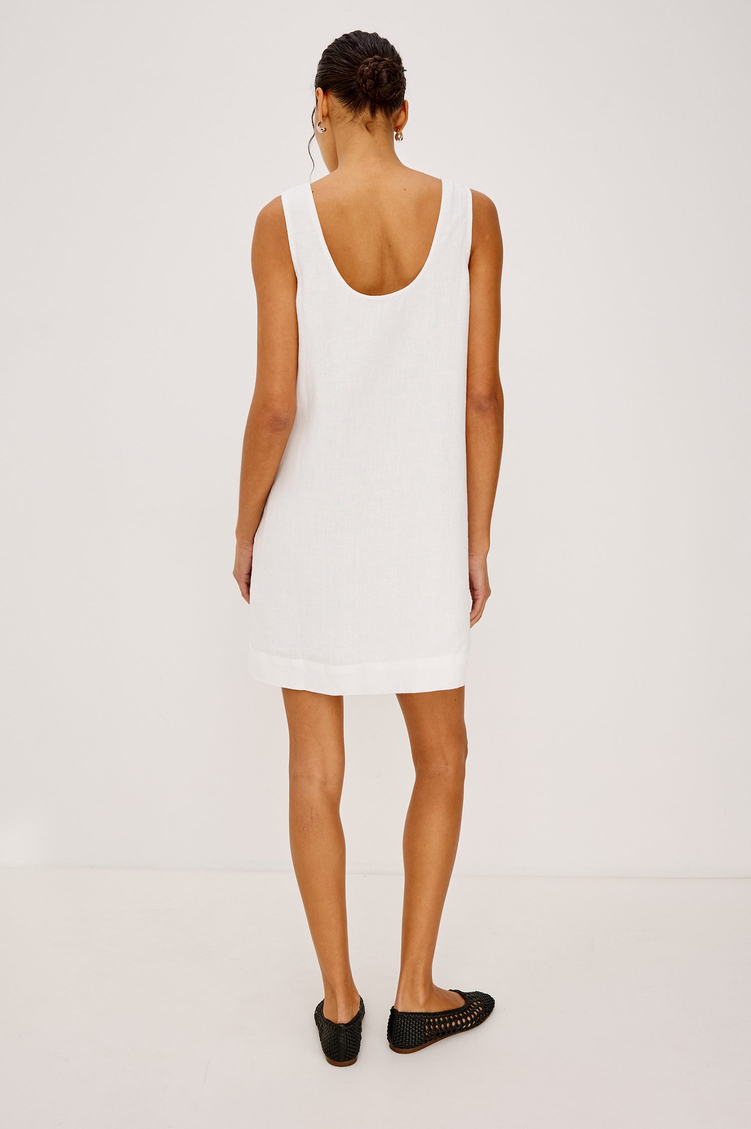 Lindsey Sleeveless Scoop Neck Mini Dress in White Colorway. Front View Shown on Model.
