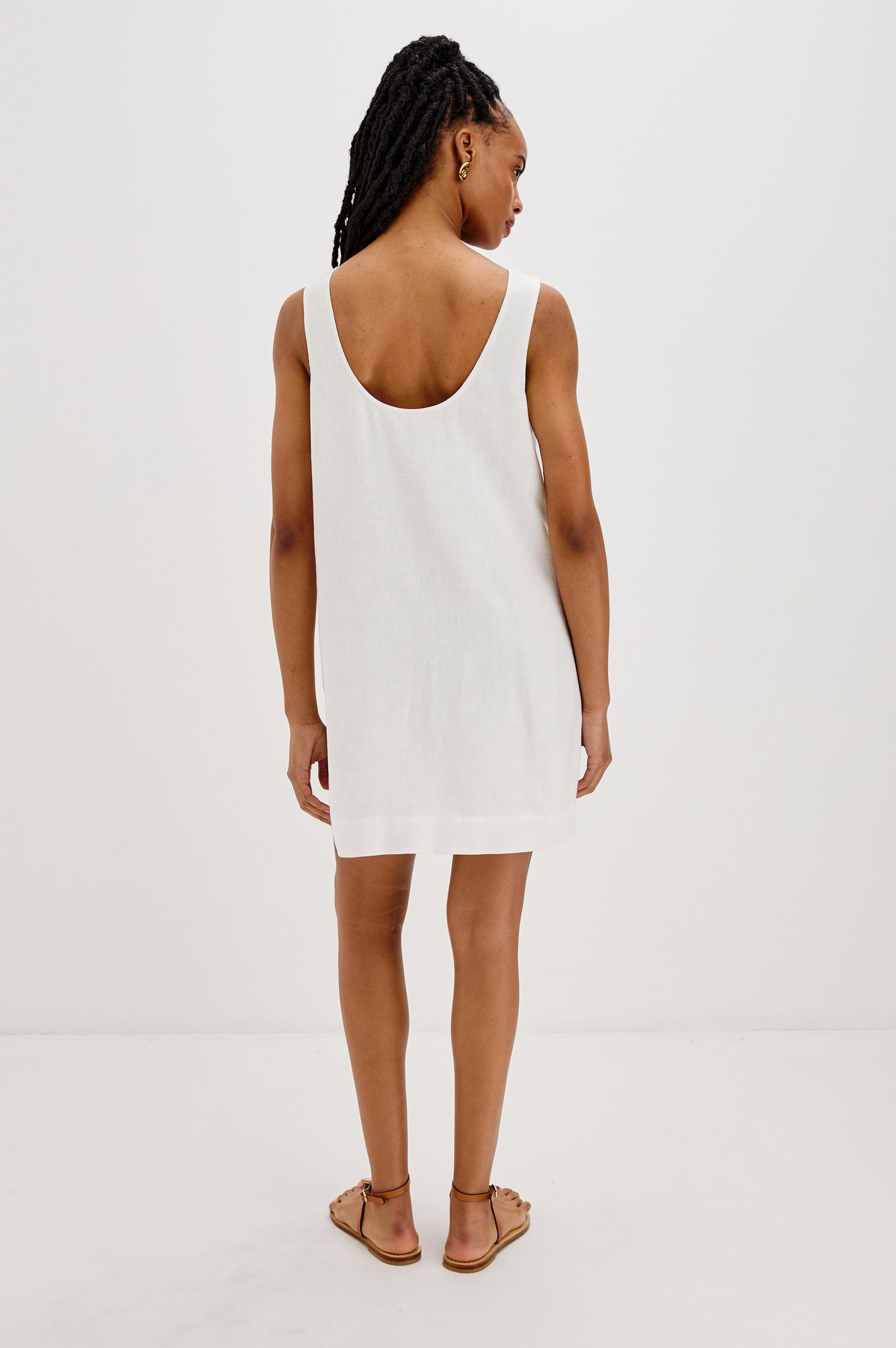 Lindsey Sleeveless Scoop Neck Mini Dress in White Colorway. Full Body Back View Shown on Model.
