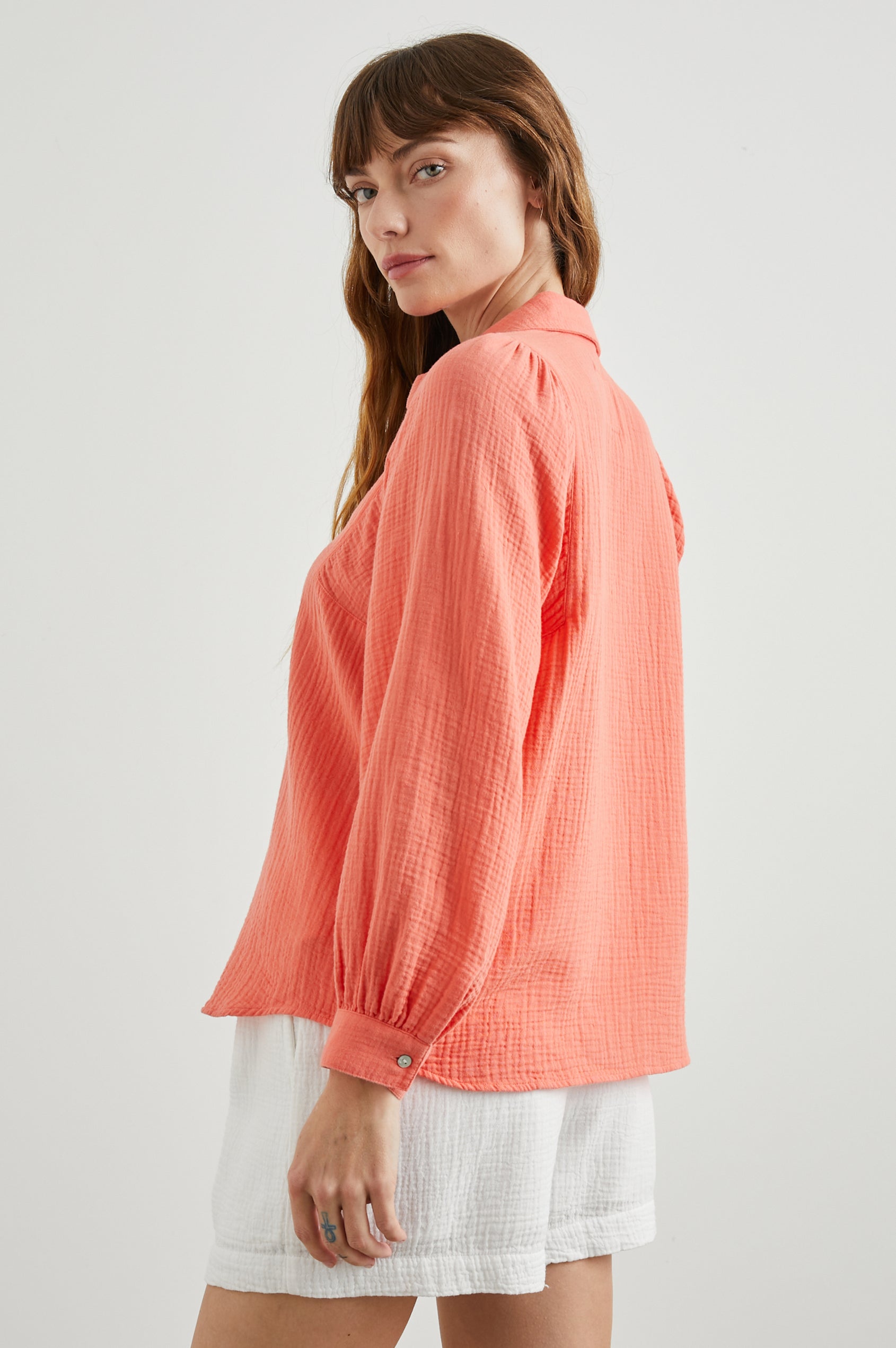 Lo Long-Sleeve Button Up with a V Neck in Papaya Colorway - Back View Featured on Model