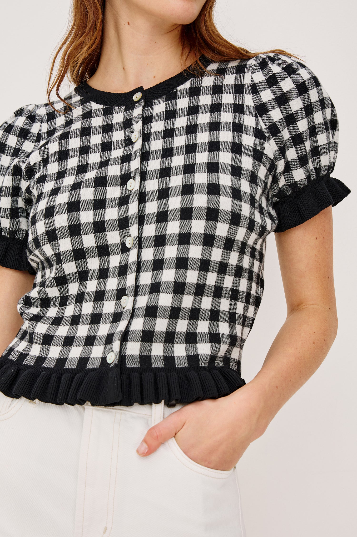 Lora Top in Wool Blend With Front Buttons Short Puff Sleeves Ruffle Trim and Classic Fit in Black White Gingham Colorway - Upper Body Front View Featured on Model