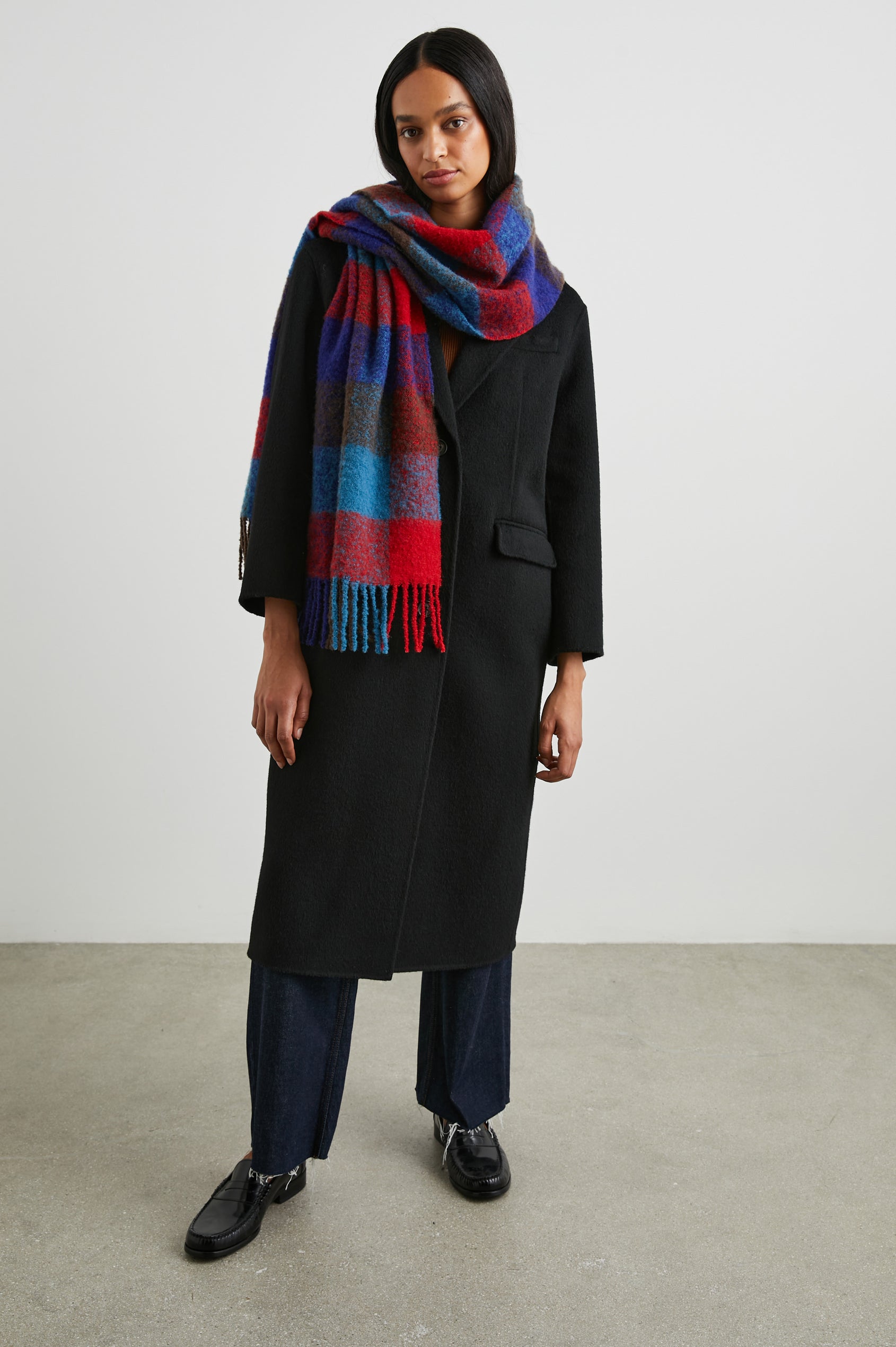 Lora Scarf with a Checkered Pattern and Tassels in Crimson Espresso Colorway, with Crimson, Espresso and Blue - Front Full Body View Featured on Model