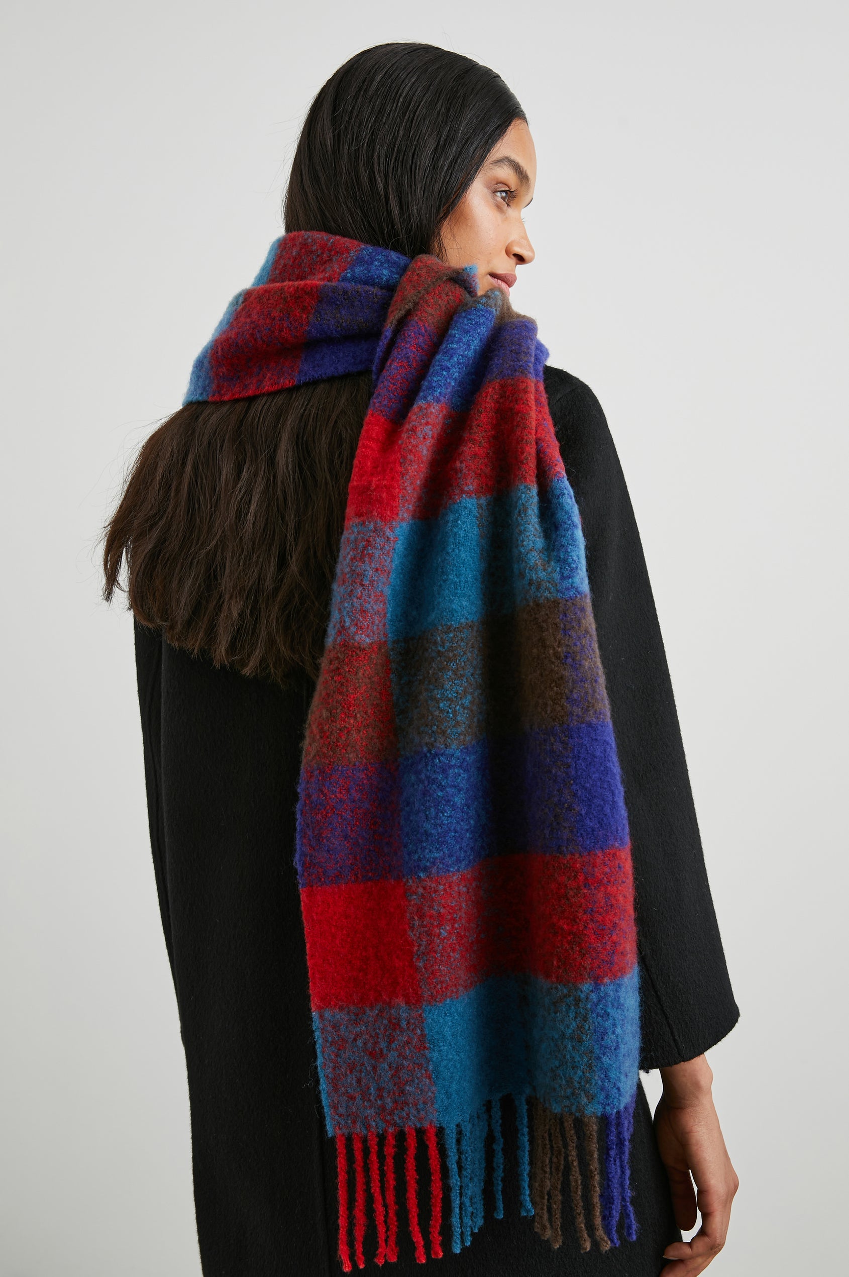 Lora Scarf with a Checkered Pattern and Tassels in Crimson Espresso Colorway, with Crimson, Espresso and Blue - Back View Featured on Model