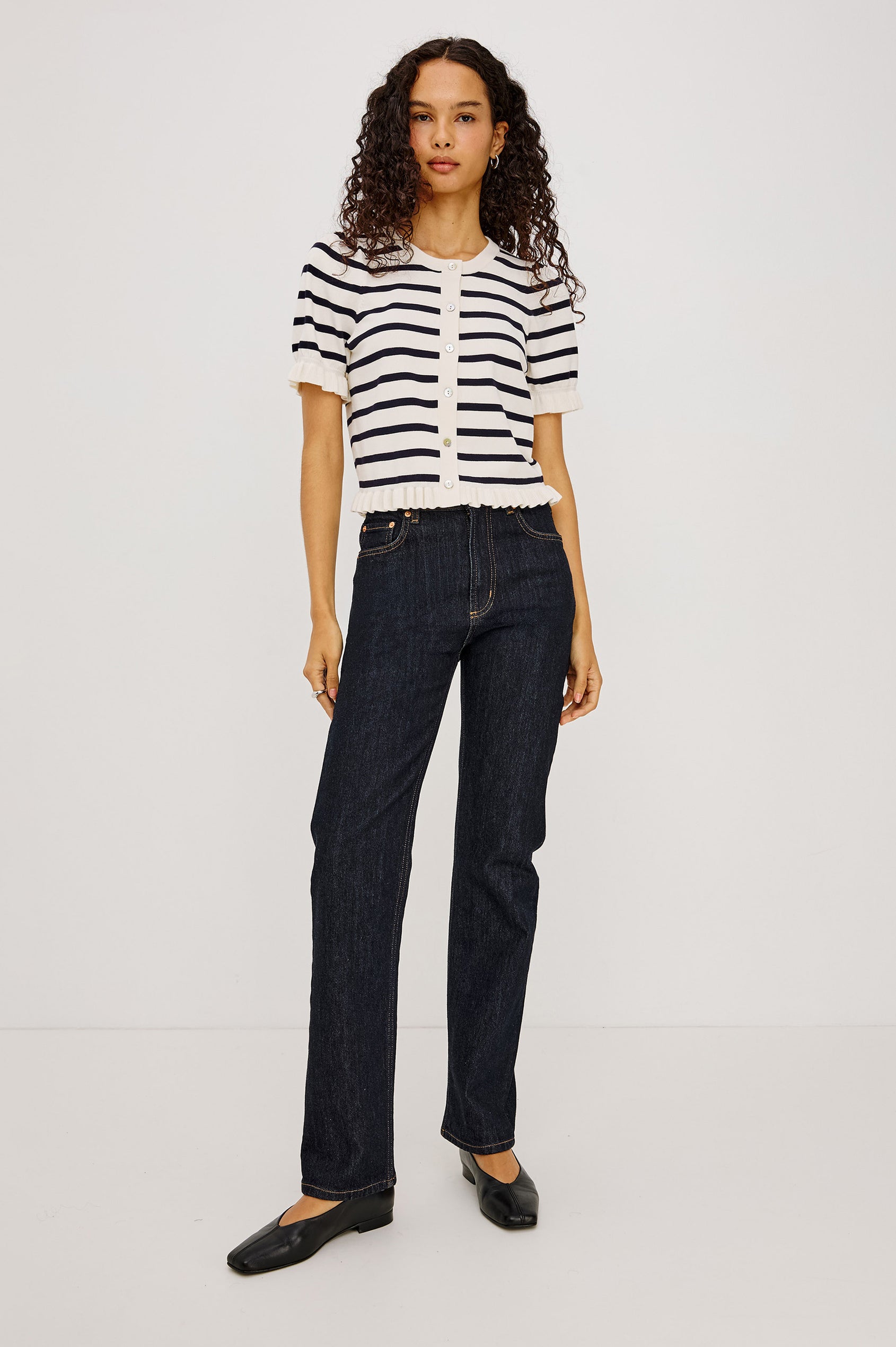 Lora Top in Wool Blend With Front Buttons, and Ruffle-Trimmed Short Puff Sleeves and Hem in Ivory Navy Stripe Colorway - Full Body Front View Featured on Model
