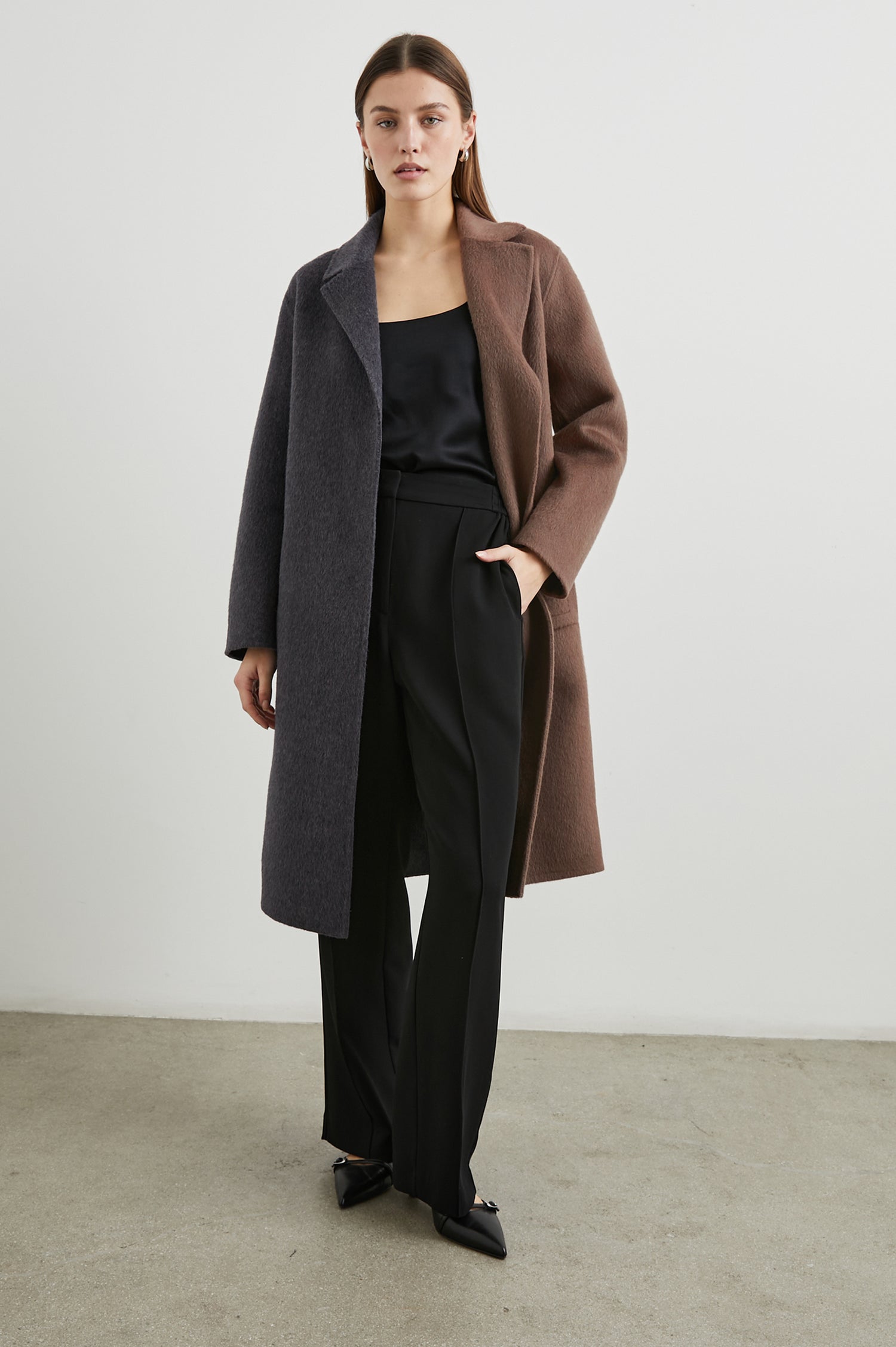 Lore Knee-Length Coat with Two Button Closure, Notched Lapels and Two Front Pockets in Charcoal Mink Mix Colorway, Left Half of Jacket is Mink and the Right Half is Charcoal - Front Full Body View Featured on Model