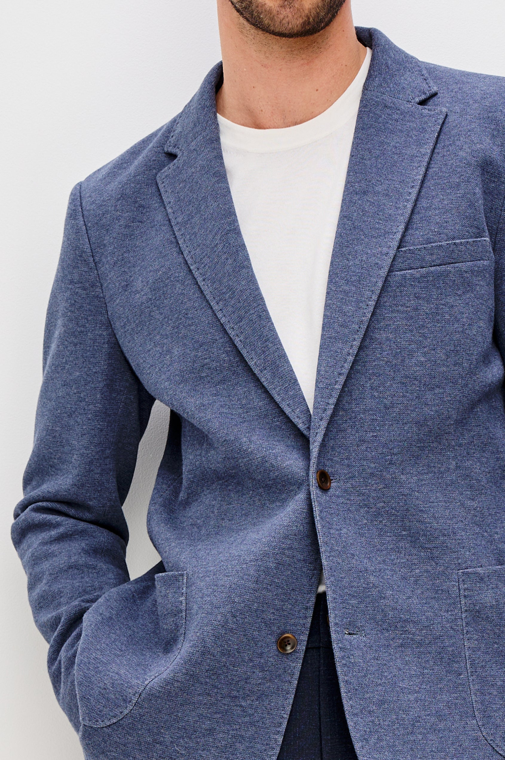 Lorenz Single Breasted Blazer with two patch pockets and one chest pocket in Navy Heather Colorway. Front Detail View Shown on Model.
