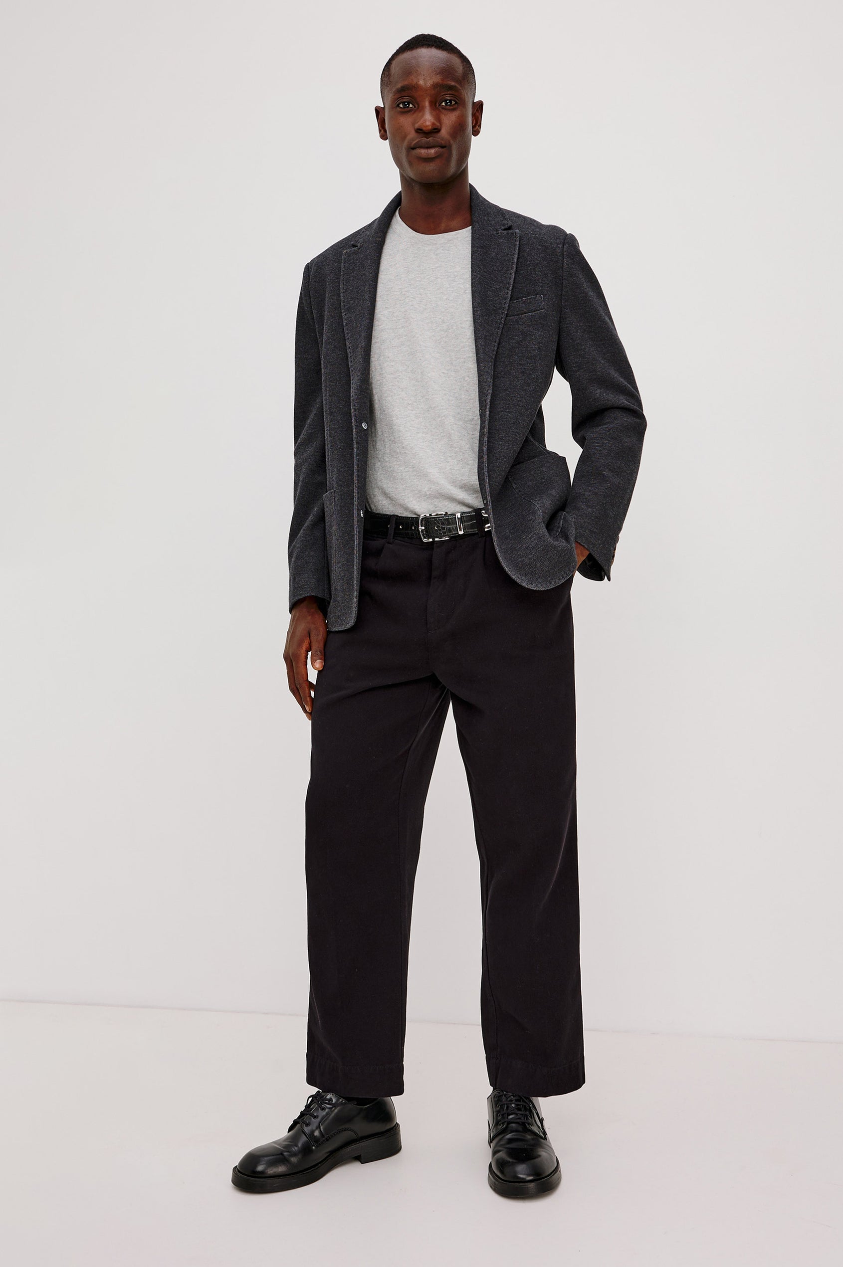 Lorenz Blazer in Ponte Jersey With Single-Breasted Design, Relaxed Fit, Jersey Lining, Notched Lapels, Chest Welt Pocket, Side Patch Pockets, Button-Cuff Long Sleeves, and Double Back Vents in Night Heather Colorway - Full Body Front View Featured on Model