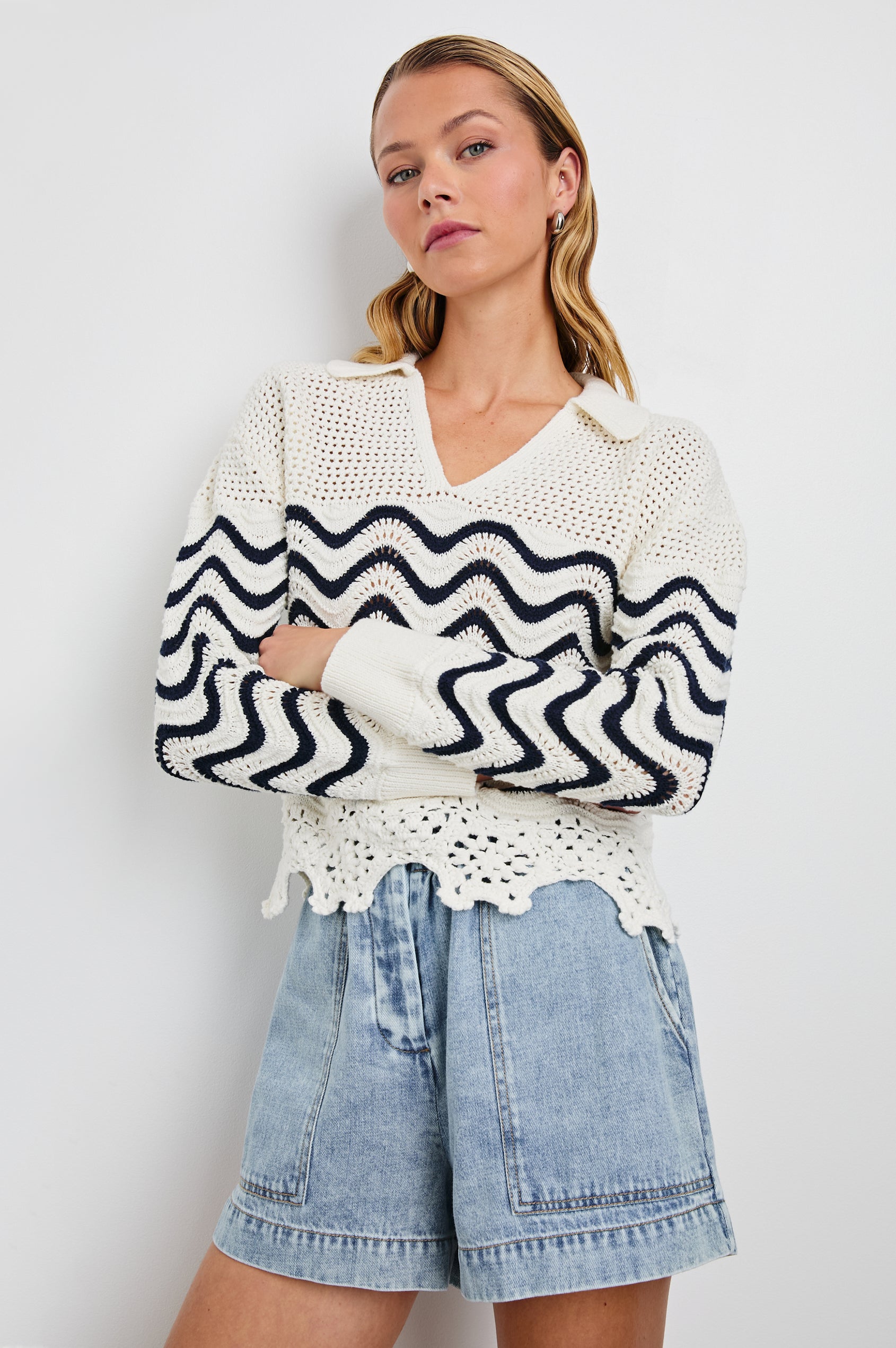 Louise Long-Sleeve, V-Neck Sweater with Collar, Floral Scalloped Hem, Open-Knit Crochet with a Solid Band at the Center in Wave Stripe Colorway, Navy waves on white - Front View on Model