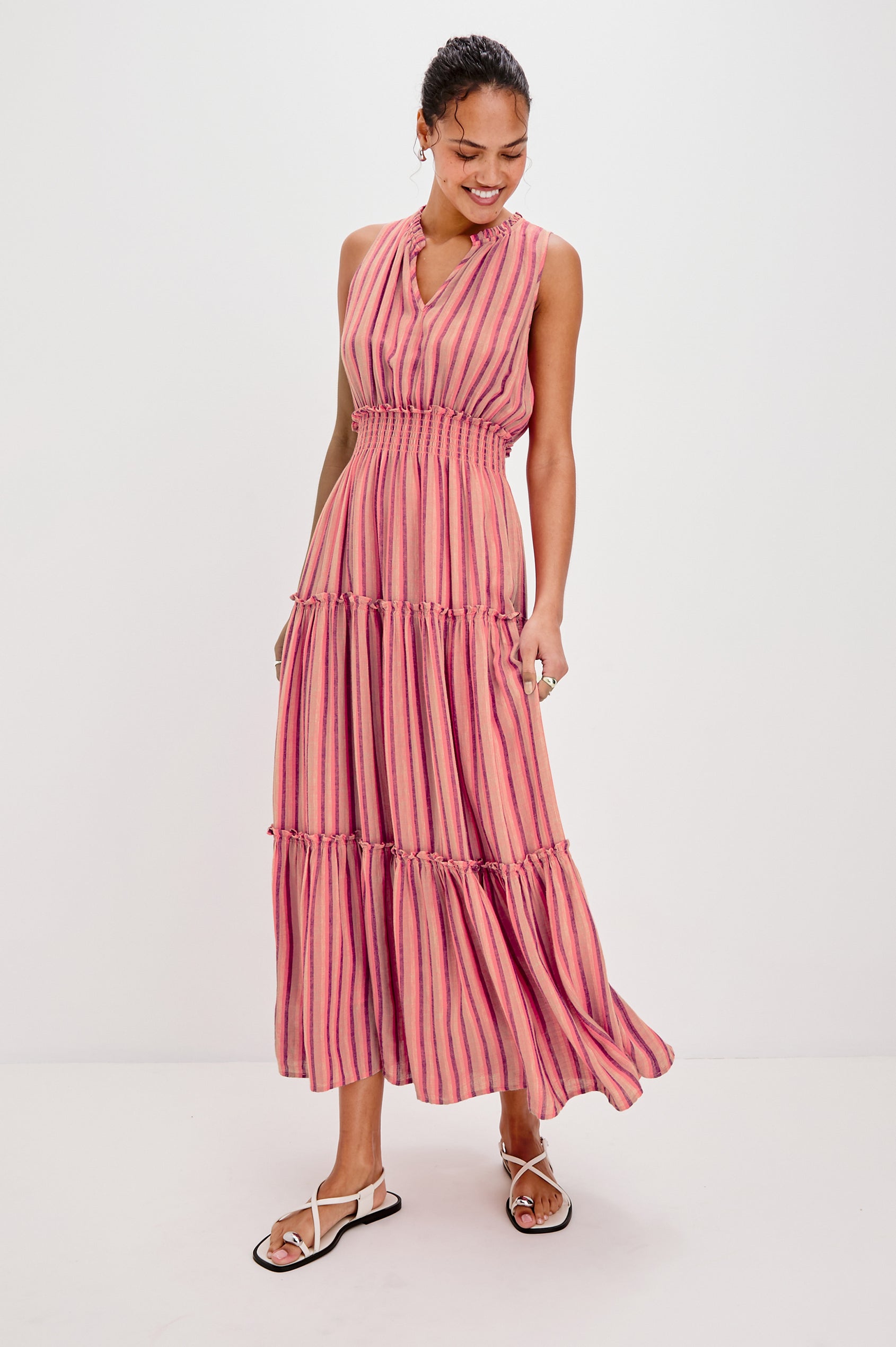Loulou V-Neck Midi Dress with Smocked Elastic Waistband and a Multi Tiered Skirt in Cabana Stripe Colorway. Full Body Front View Shown on Model.